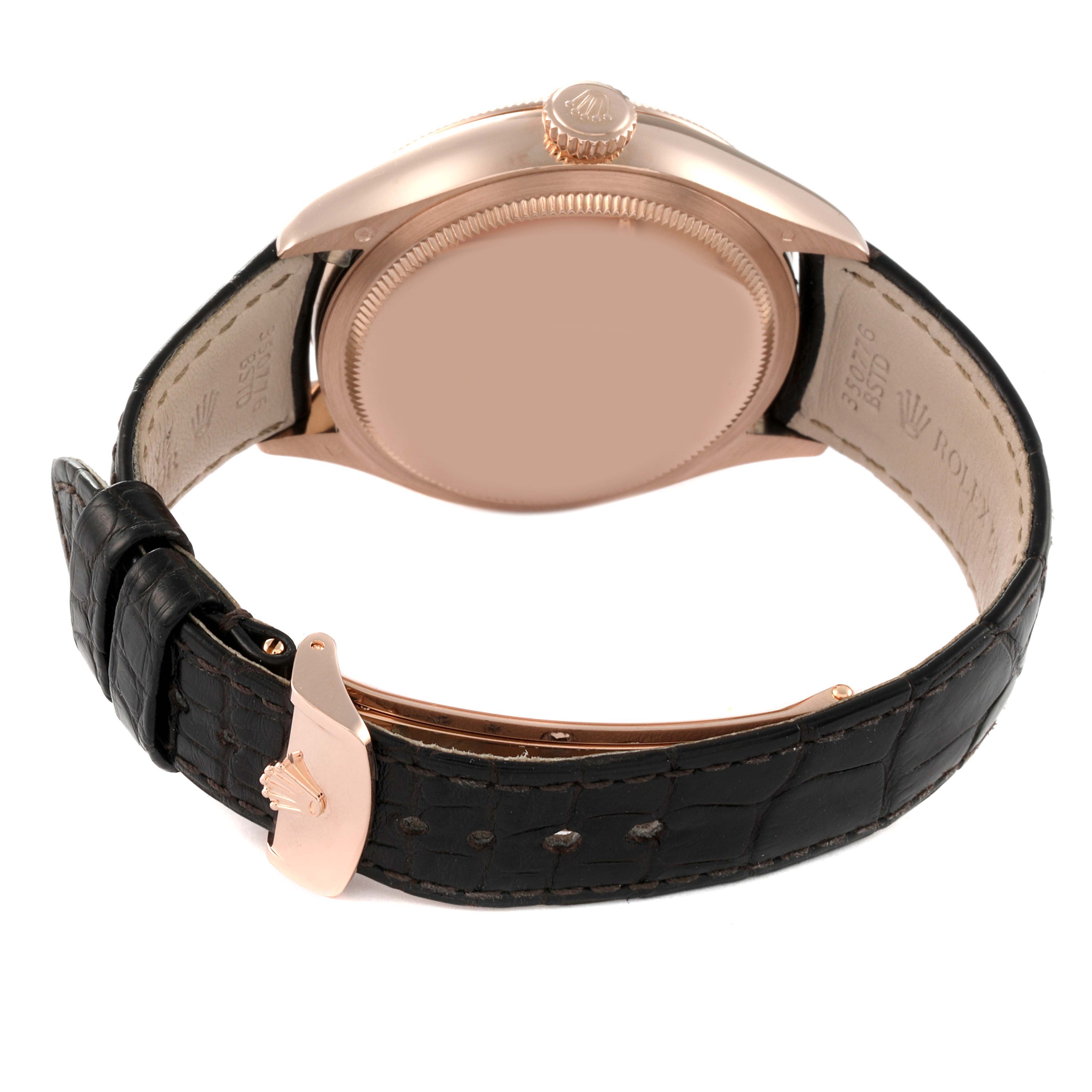The image shows the back view of a Rolex Cellini 50535 Men
s Rose Gold White Dial 50535 Men
s Rose Gold White Dial watch, highlighting the case back, crown, and leather strap with the clasp.