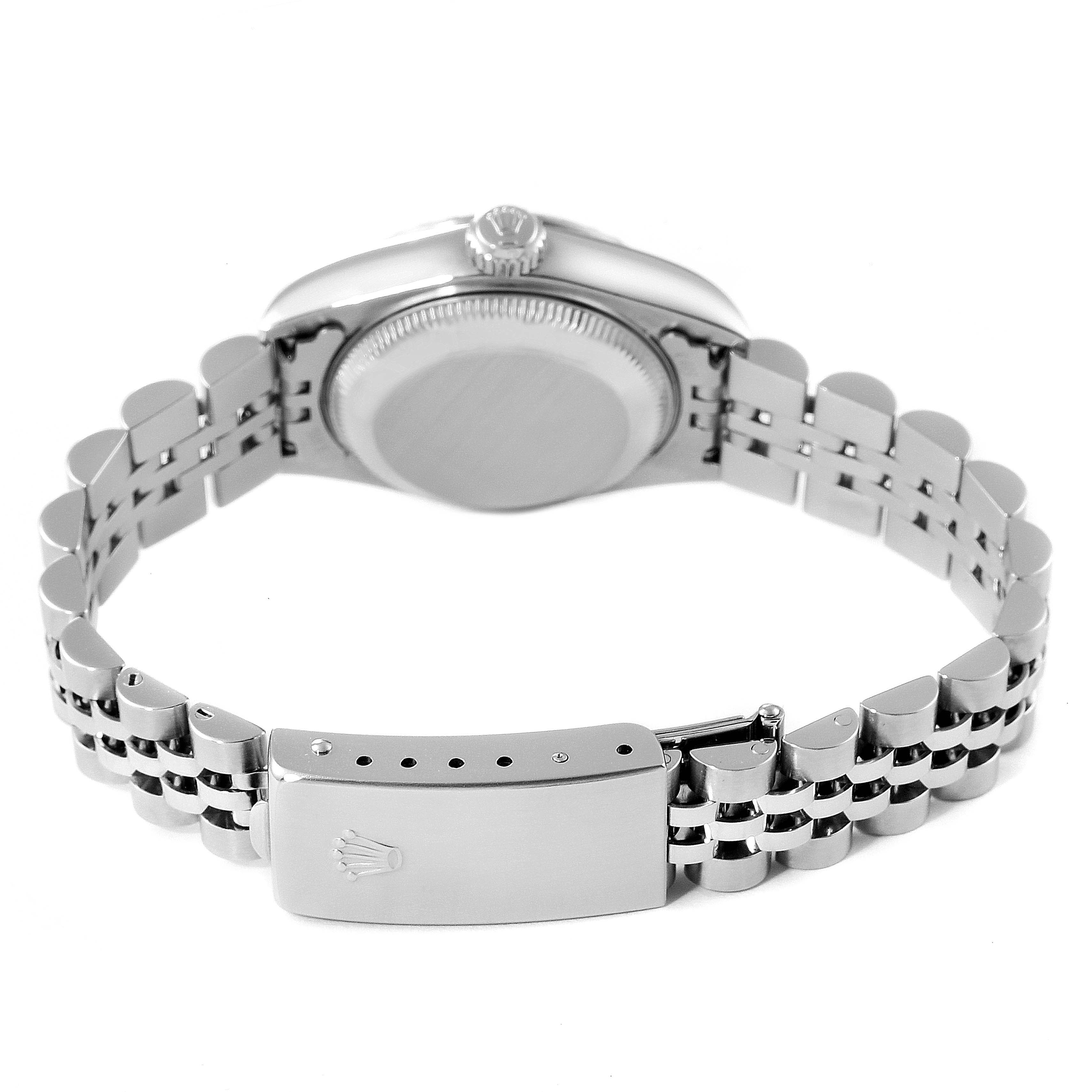 This image shows the back case and bracelet clasp of a Rolex Date 79240 Women's Stainless Steel Black Dial 79240 Women's Stainless Steel Black Dial model watch.