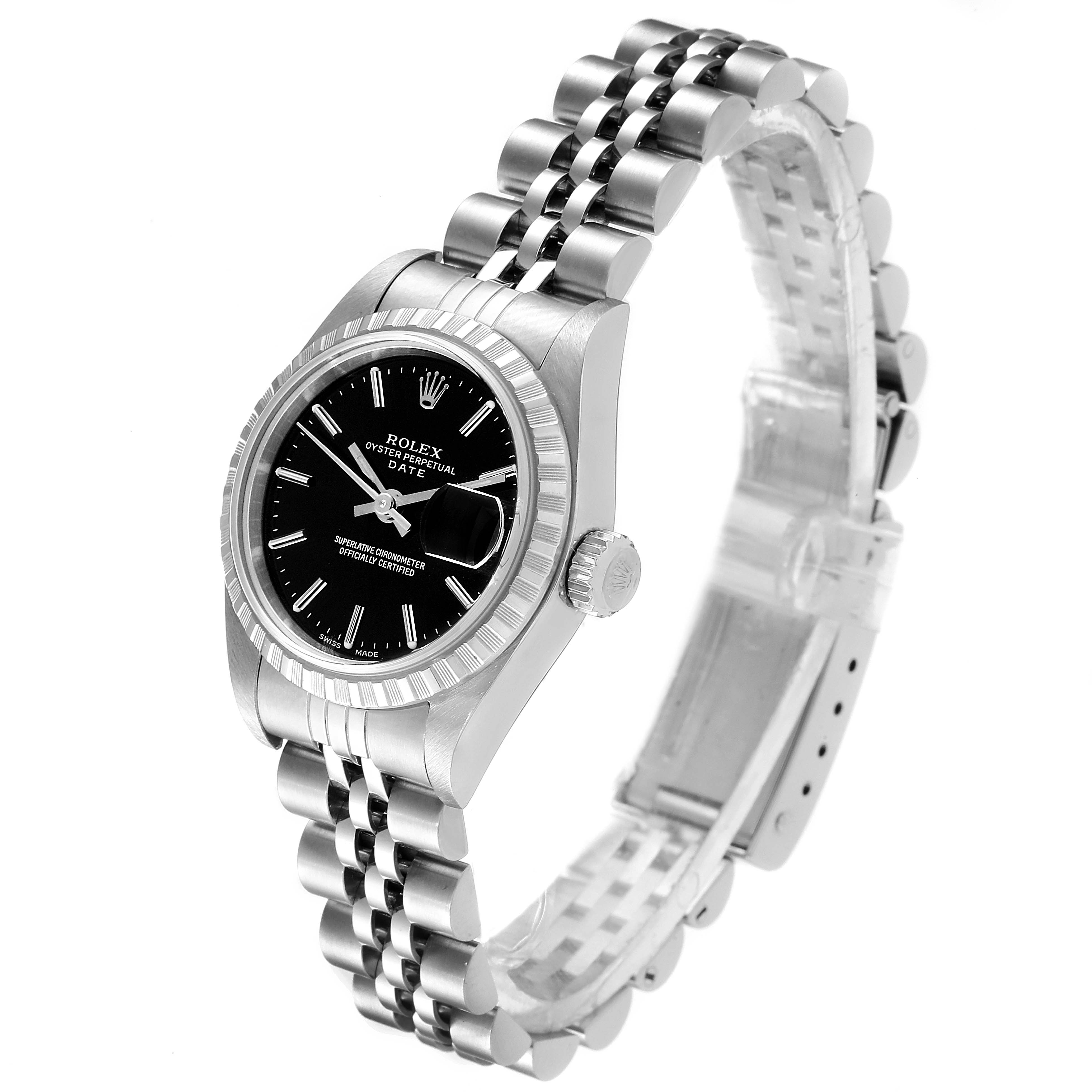 The image shows a Rolex Date 79240 Women's Stainless Steel Black Dial 79240 Women's Stainless Steel Black Dial model watch from a three-quarter angle, highlighting its black dial, fluted bezel, and jubilee bracelet.