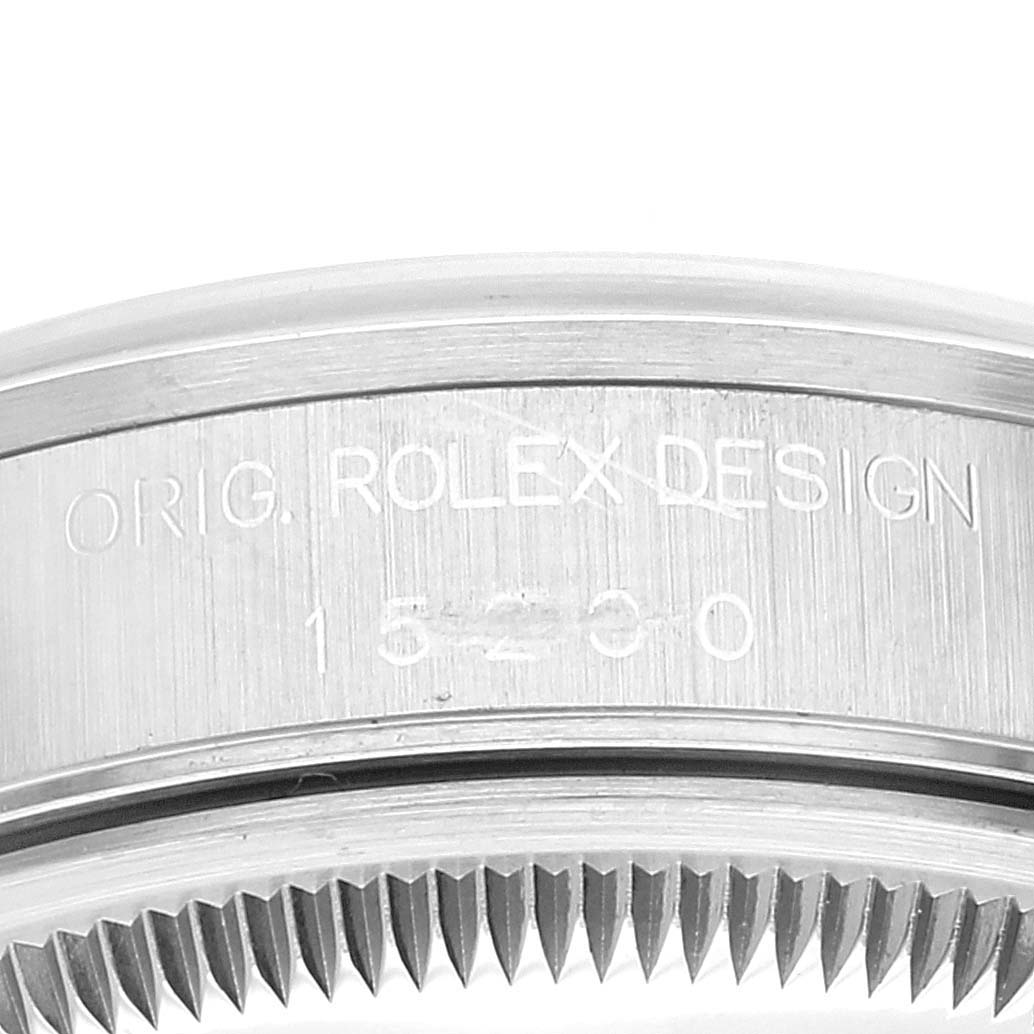 The image shows a close-up of the case side and bezel of a Rolex Date 15200 Men's Stainless Steel White Dial 15200 Men's Stainless Steel White Dial model, displaying "ORIG. ROLEX DESIGN" and the model number.
