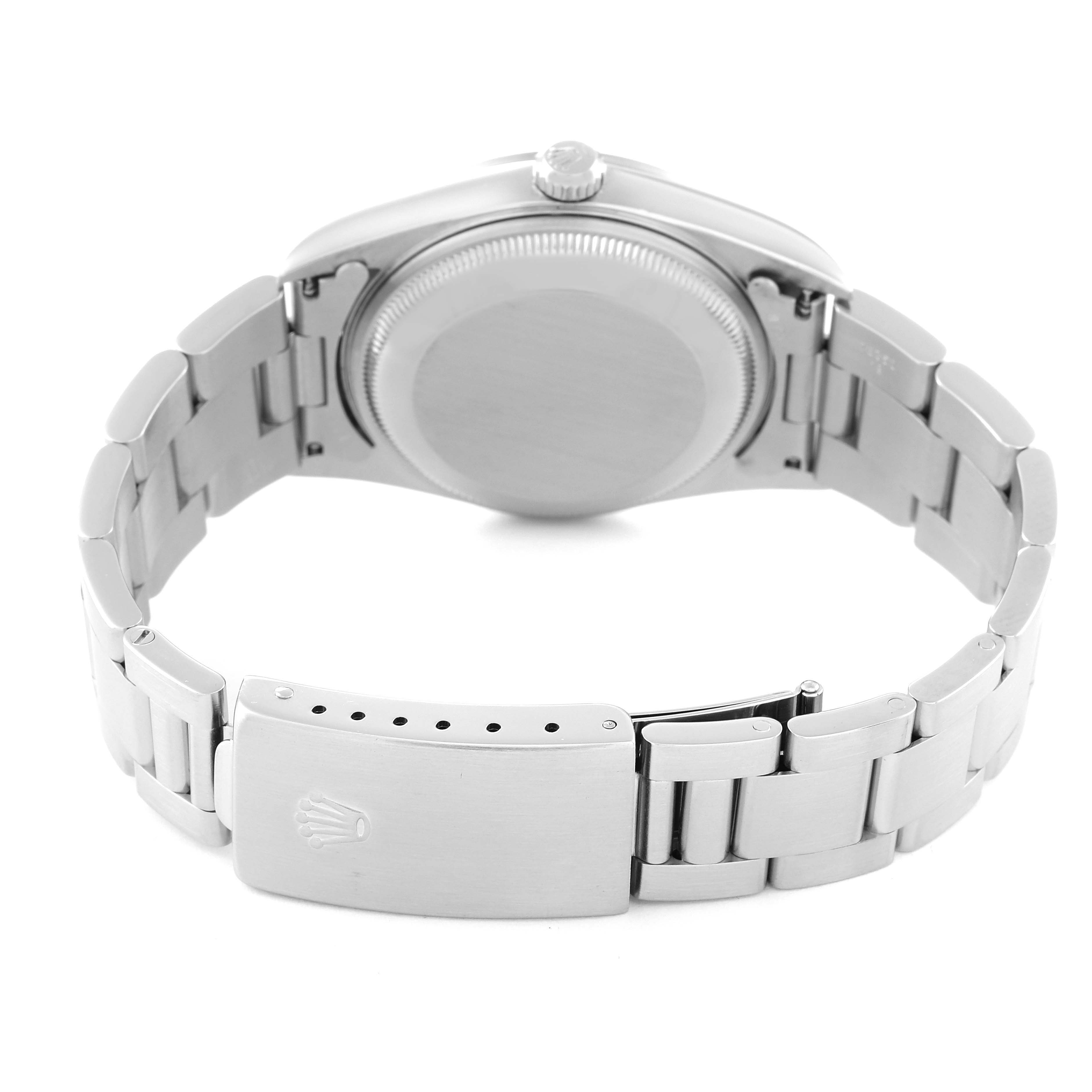 The image shows the back case, crown, and bracelet clasp of a Rolex Date 15200 Men's Stainless Steel White Dial 15200 Men's Stainless Steel White Dial model watch.