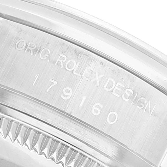 The image shows a close-up of the Rolex Datejust 179160 Women's Stainless Steel Silver Dial 179160 Women's Stainless Steel Silver Dial model's rehaut with engravings of the brand and model number.