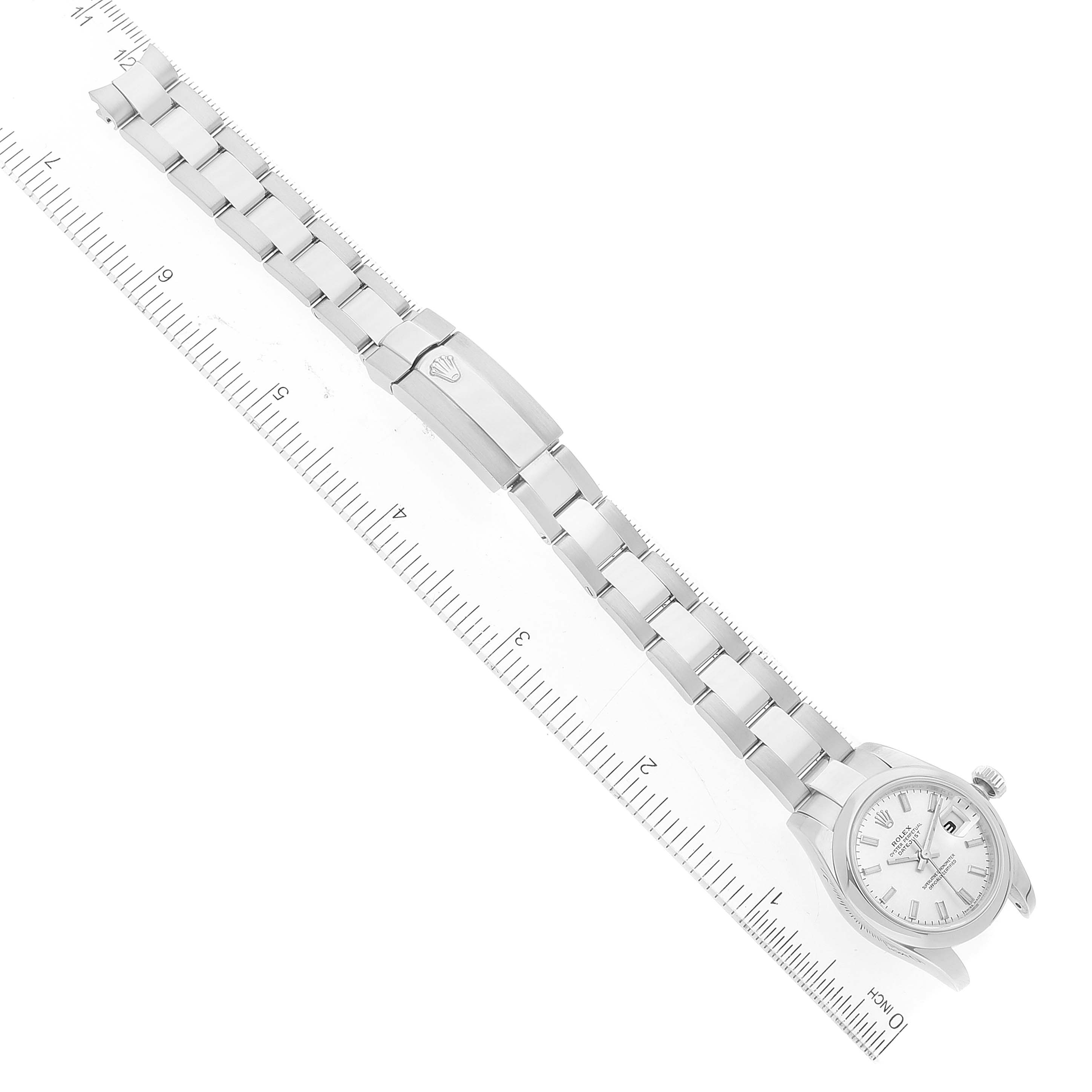 The image shows the entire length of a Rolex Datejust 179160 Women's Stainless Steel Silver Dial 179160 Women's Stainless Steel Silver Dial watch, including its face and bracelet, aligned with a ruler.