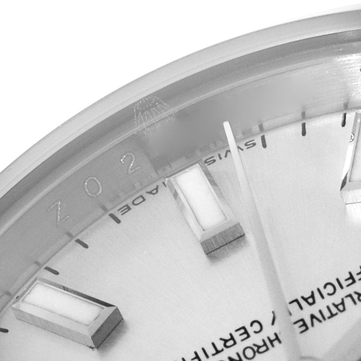 This close-up image shows the Rolex Datejust 179160 Women's Stainless Steel Silver Dial 179160 Women's Stainless Steel Silver Dial watch's face, highlighting the hour markers, part of the hands, and the "SWISS MADE" inscription.
