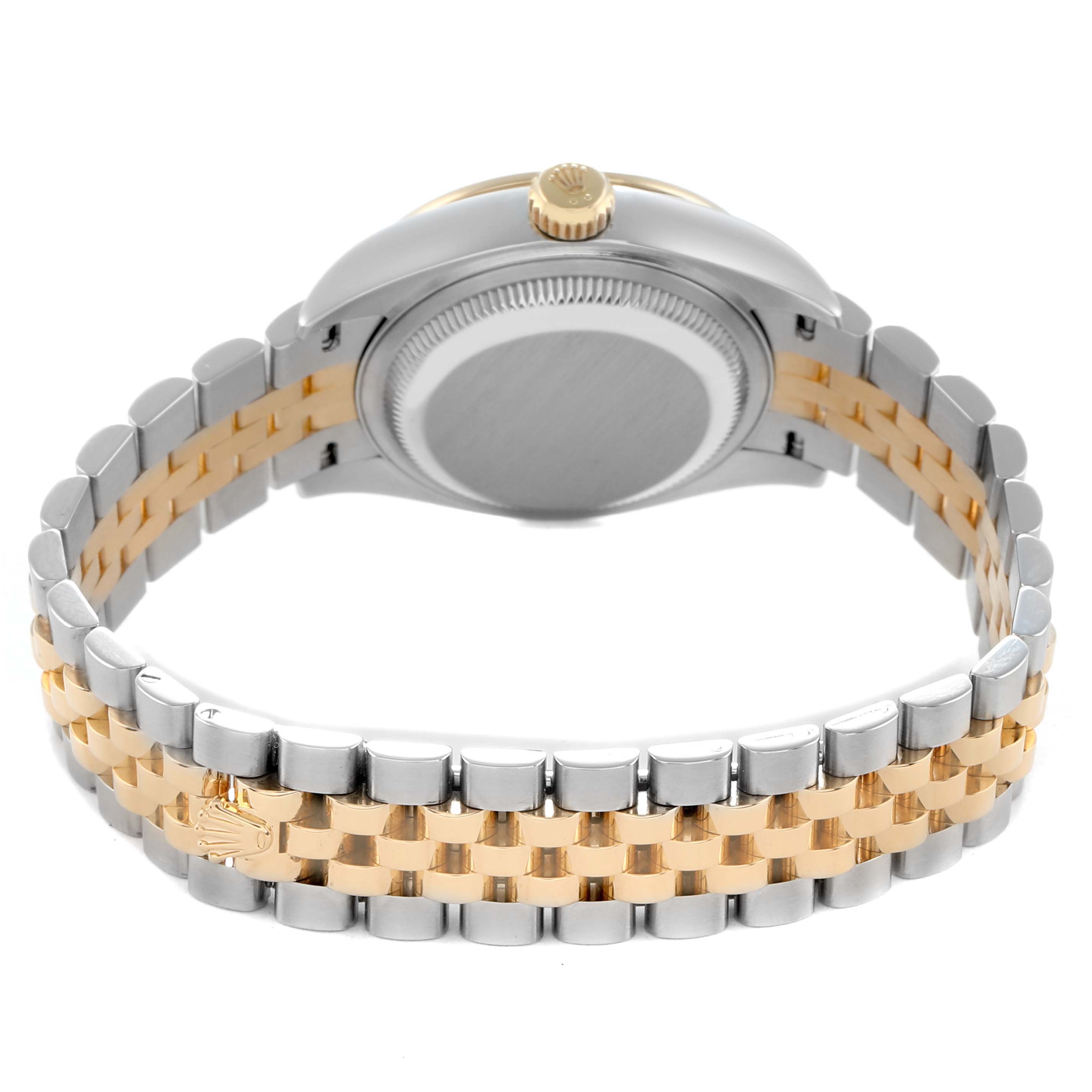 The Rolex Datejust 279383 Women
s Steel and Gold (two tone) Champagne Dial watch is shown from the back, highlighting the case back and Jubilee bracelet with a gold crown visible on the clasp.