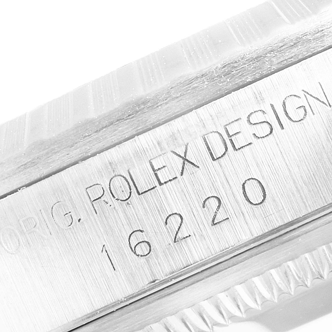 This image shows a close-up of the case side of the Rolex Datejust 16220 Men
s Stainless Steel Blue Dial 16220 Men
s Stainless Steel Blue Dial, featuring model number 16220.