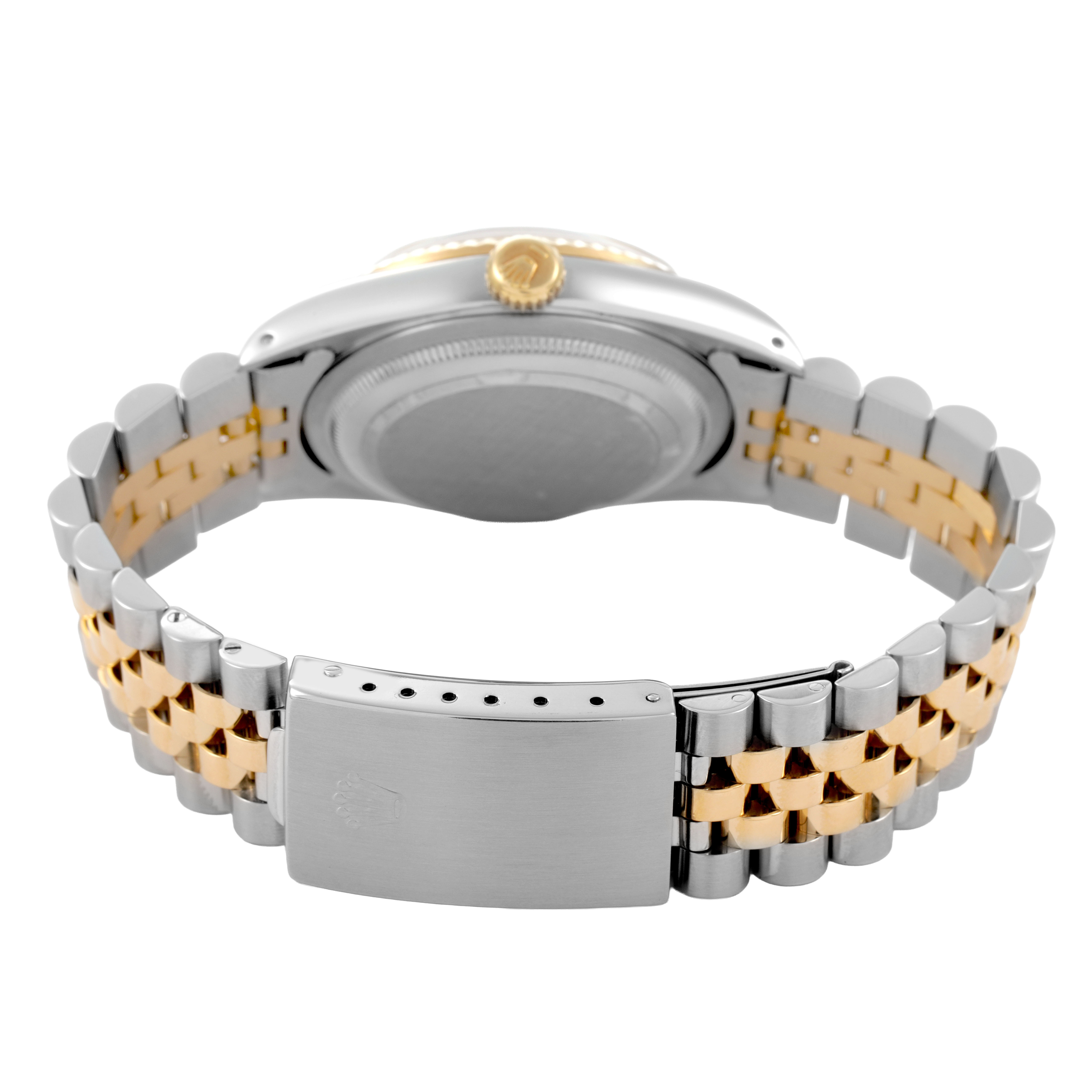 The image shows the back and side of the Rolex Datejust 16233 Men's Steel and Gold (two tone) Champagne Dial, highlighting its two-tone bracelet and clasp.