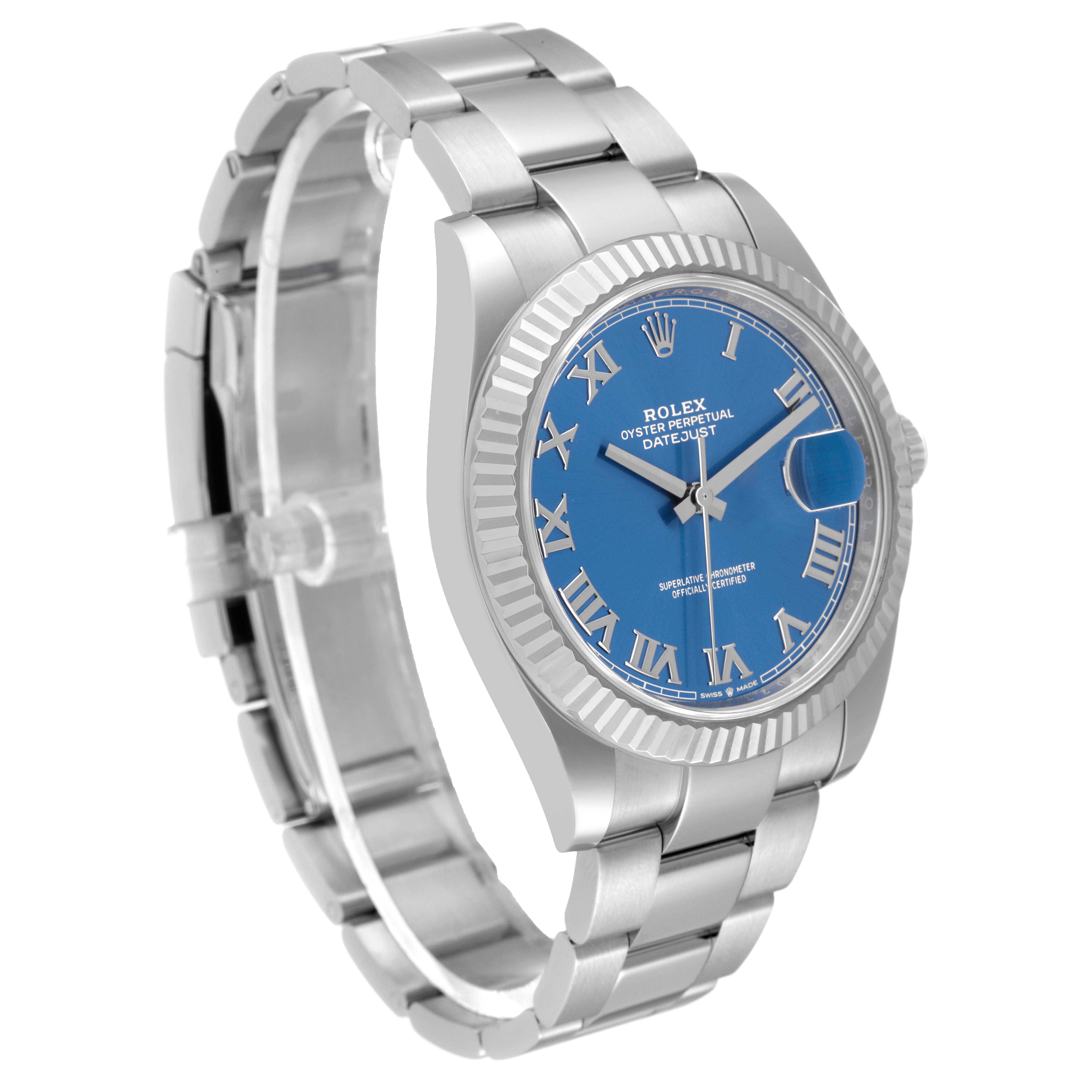 The image shows a three-quarter view of the Rolex Datejust 41 126334 Men's Stainless Steel Blue Dial 126334 Men's Stainless Steel Blue Dial watch, highlighting its bracelet, bezel, and blue dial.