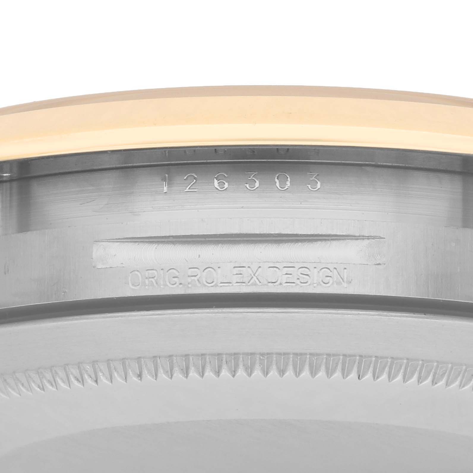 The image shows a close-up of the side of a Rolex Datejust 41 126303 Men
s Steel and Gold (two tone) Silver Dial, focusing on the engraved model number and "Orig. Rolex Design."