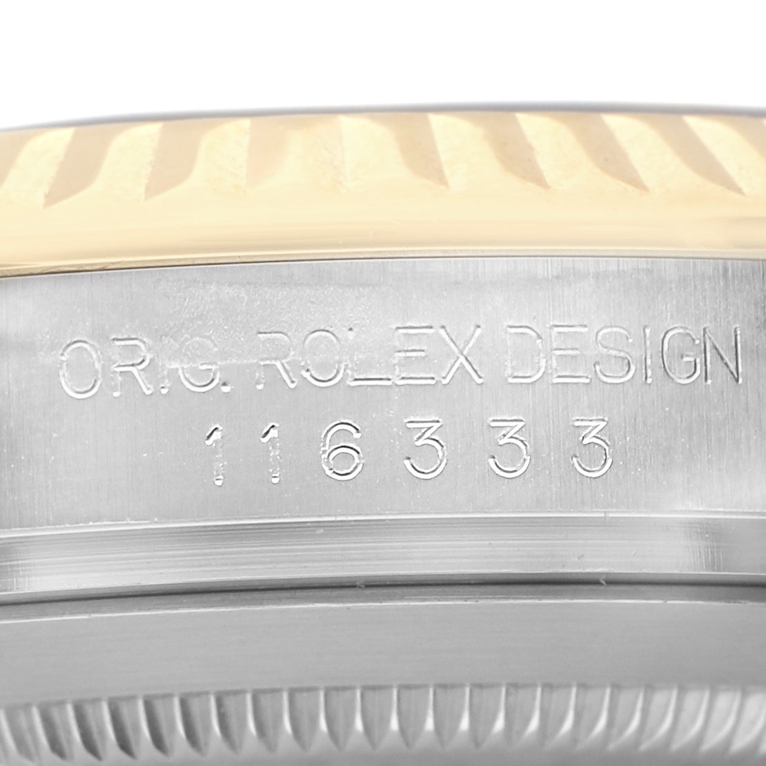 The image shows the side of a Rolex Datejust 41 116333 Men's Steel and Gold (two tone) Black Dial watch, highlighting the engraved model and design details.