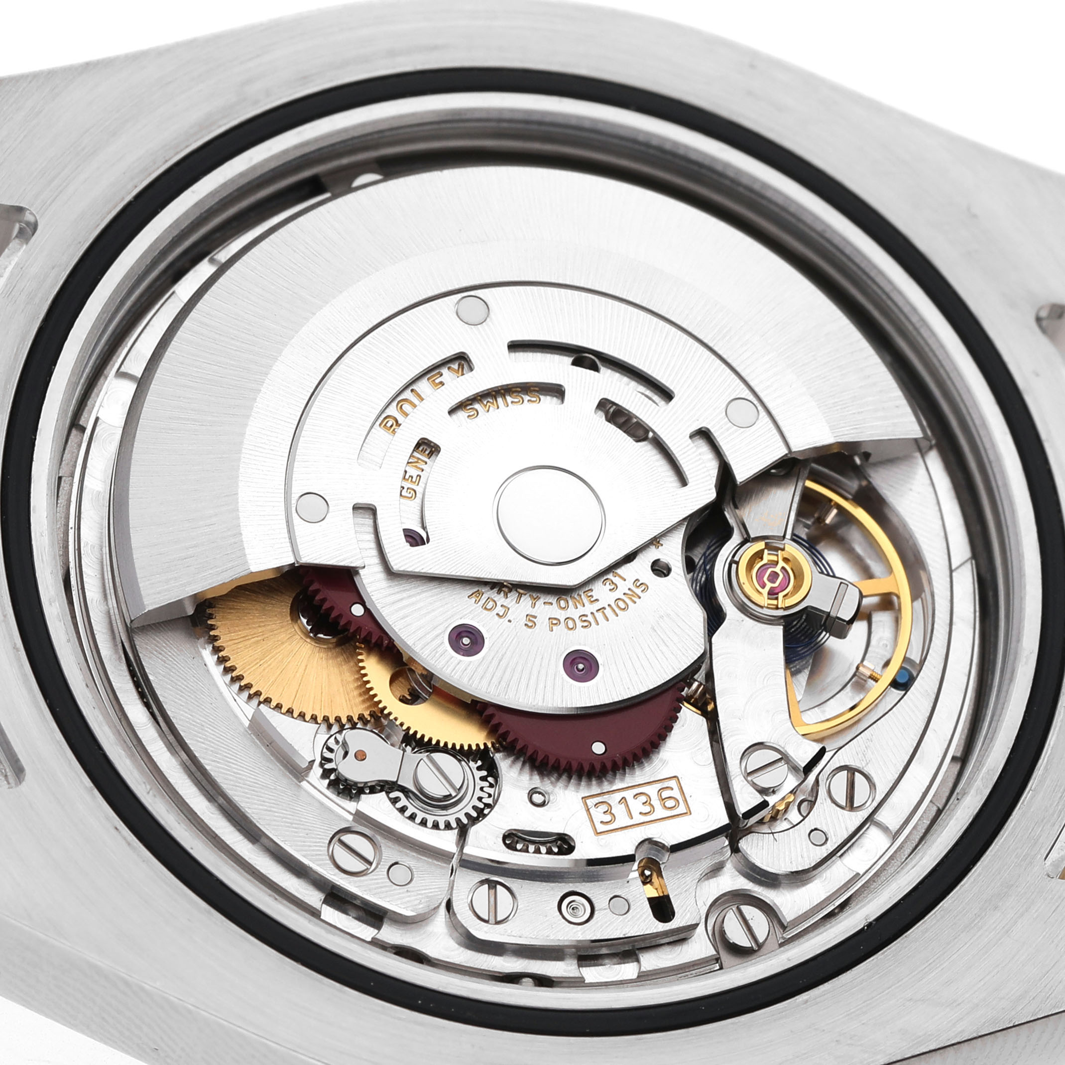 This image shows the intricate movement mechanism of a Rolex Datejust 41 116333 Men's Steel and Gold (two tone) Black Dial, focused on gears and components from above.