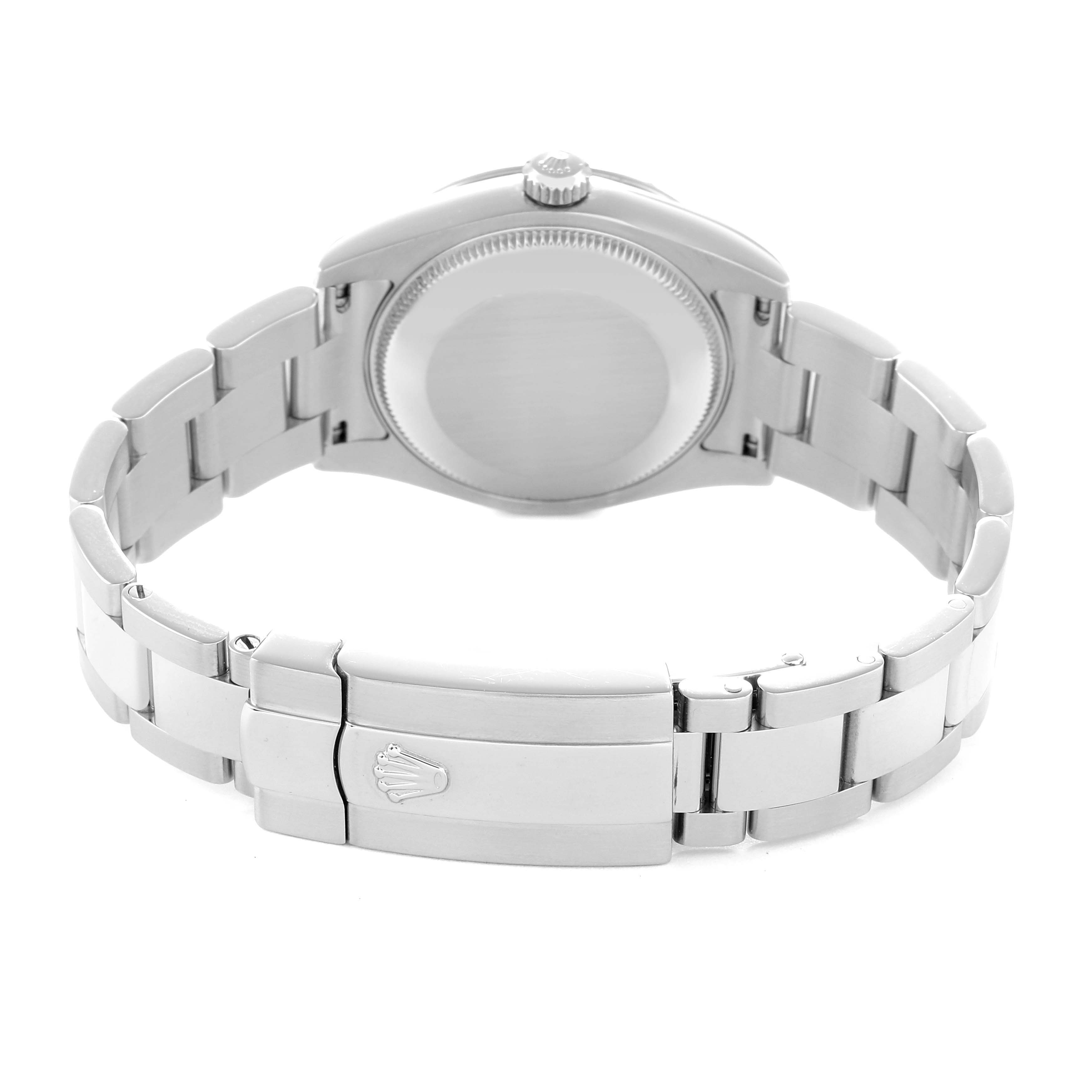 The image shows the back and clasp of a Rolex Mid-Size 178344 Women
s Stainless Steel Blue Dial watch, highlighting its bracelet and case back.