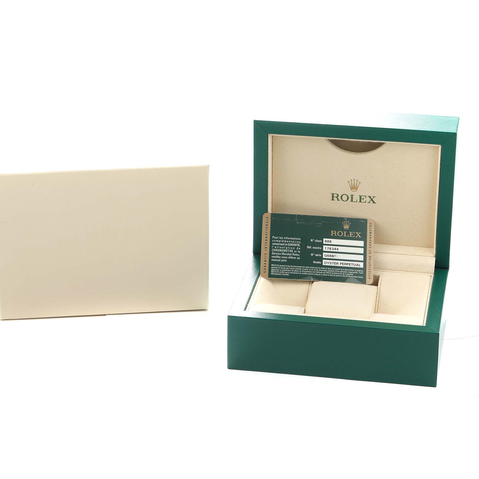 The image shows a Rolex Mid-Size 178344 Women
s Stainless Steel Blue Dial watch box, presenting an open box with a displayed warranty card and compartments.