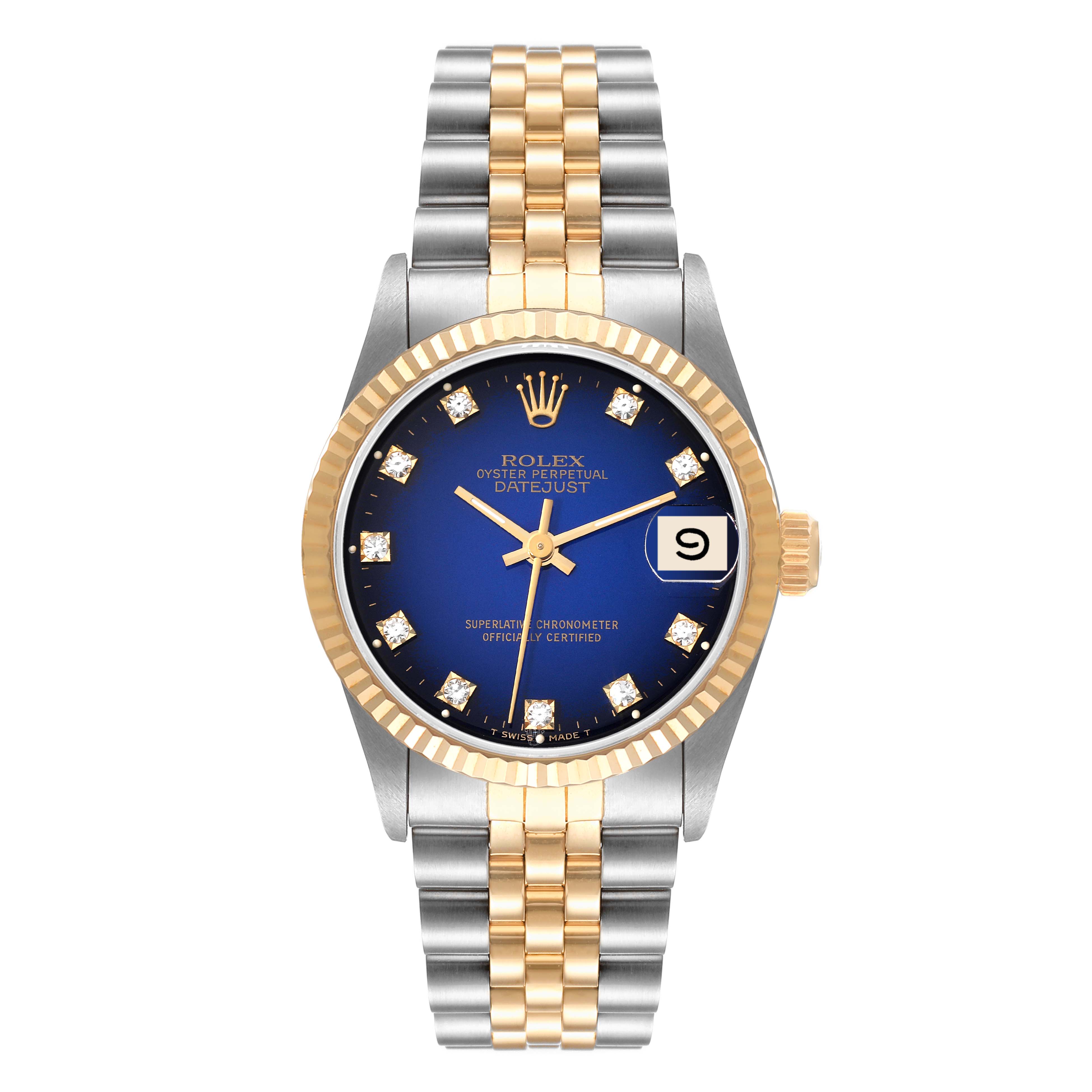 This Rolex Mid-Size 68273 Women's Steel and Gold (two tone) Blue Dial 68273 Women's Steel and Gold (two tone) Blue Dial watch is shown from a front angle, featuring a blue dial, gold bezel, date display, and a two-tone metal bracelet.