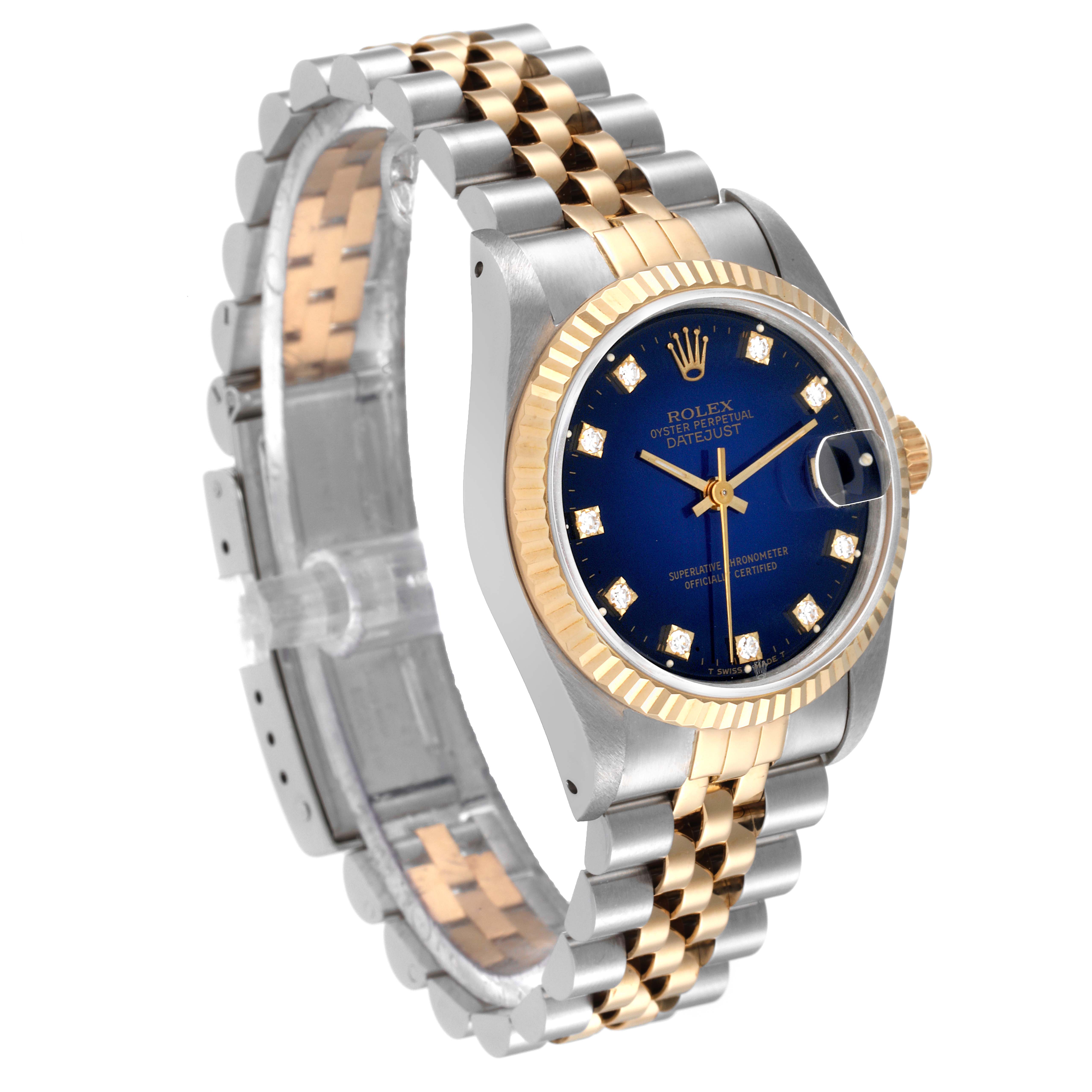 This Rolex Mid-Size 68273 Women's Steel and Gold (two tone) Blue Dial 68273 Women's Steel and Gold (two tone) Blue Dial watch is viewed at a three-quarter angle, showing its case, crown, dial, bezel, and two-tone bracelet.