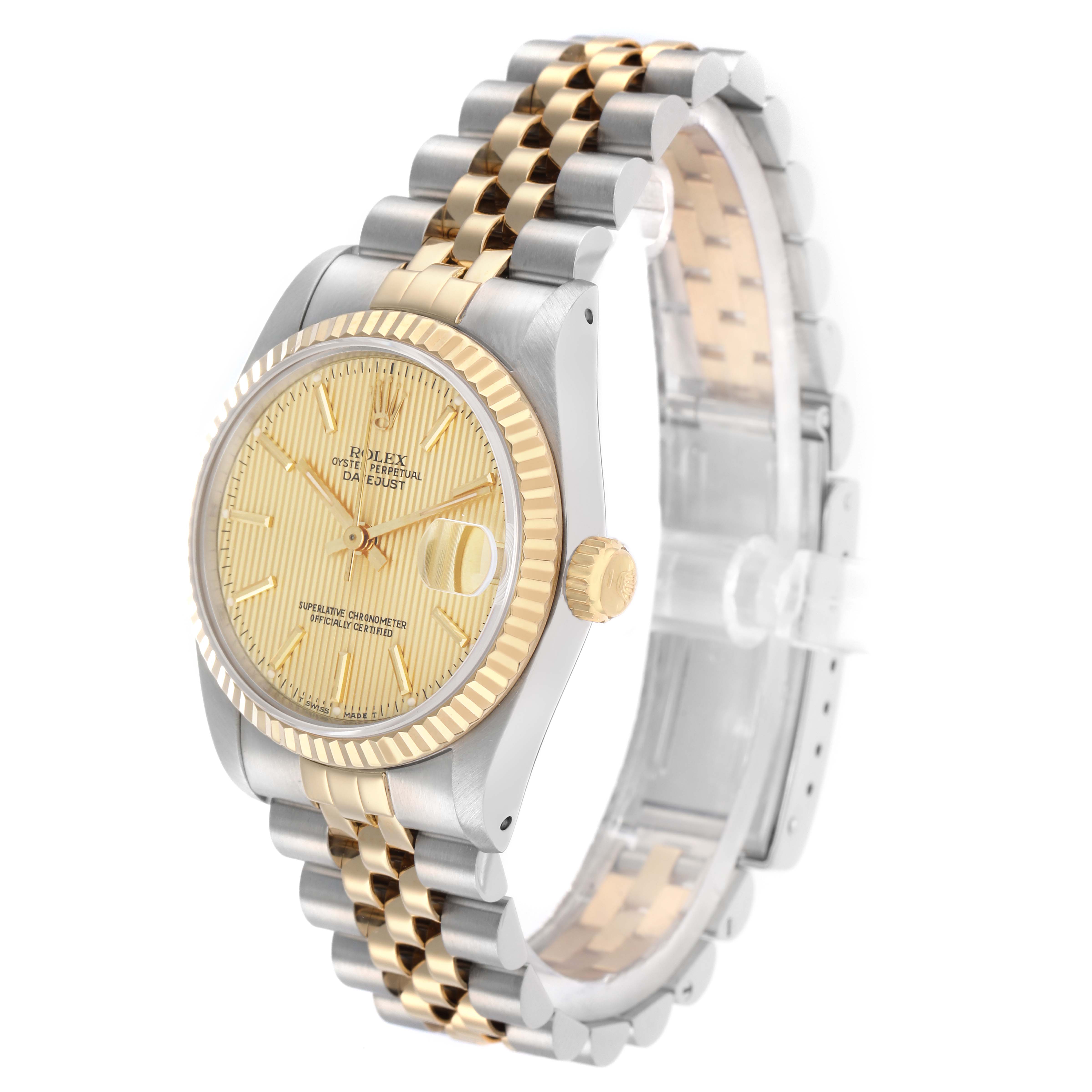 The Rolex Mid-Size 68273 Women
s Steel and Gold (two tone) Champagne Dial watch is shown at a three-quarter angle, highlighting the face, crown, and two-tone bracelet.