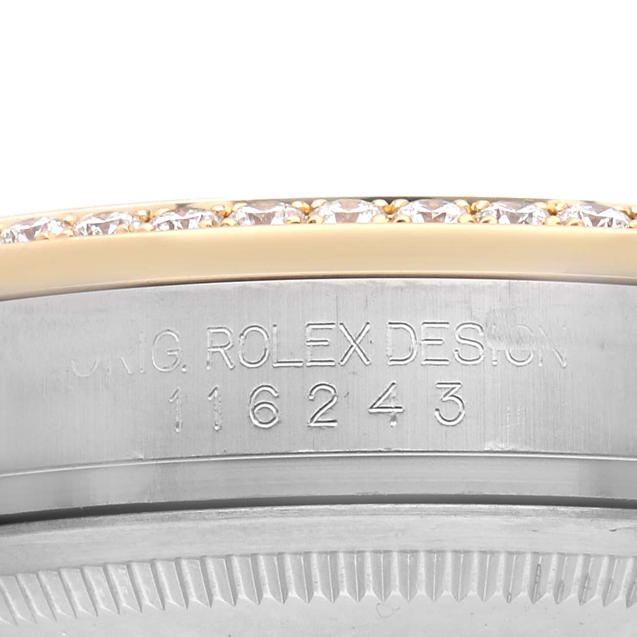 The image shows a close-up of the side of a Rolex Datejust 116243 Men
s Steel and Gold (two tone) Mother of Pearl Dial watch, highlighting the bezel with diamonds and engraved model number.