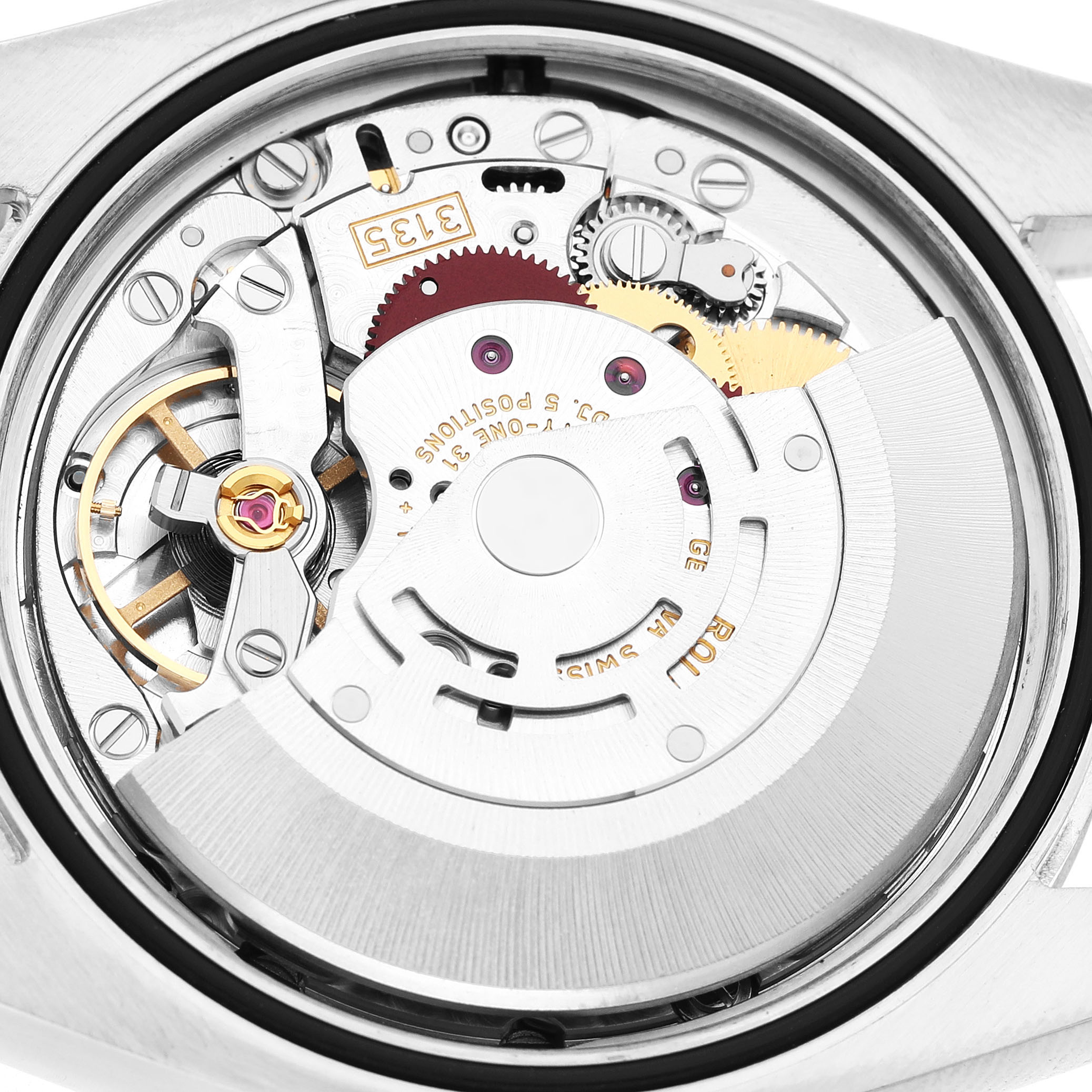 The image shows the movement of a Rolex Datejust 116200 Men's Stainless Steel Blue Dial watch, highlighting gears and the rotor from the back.
