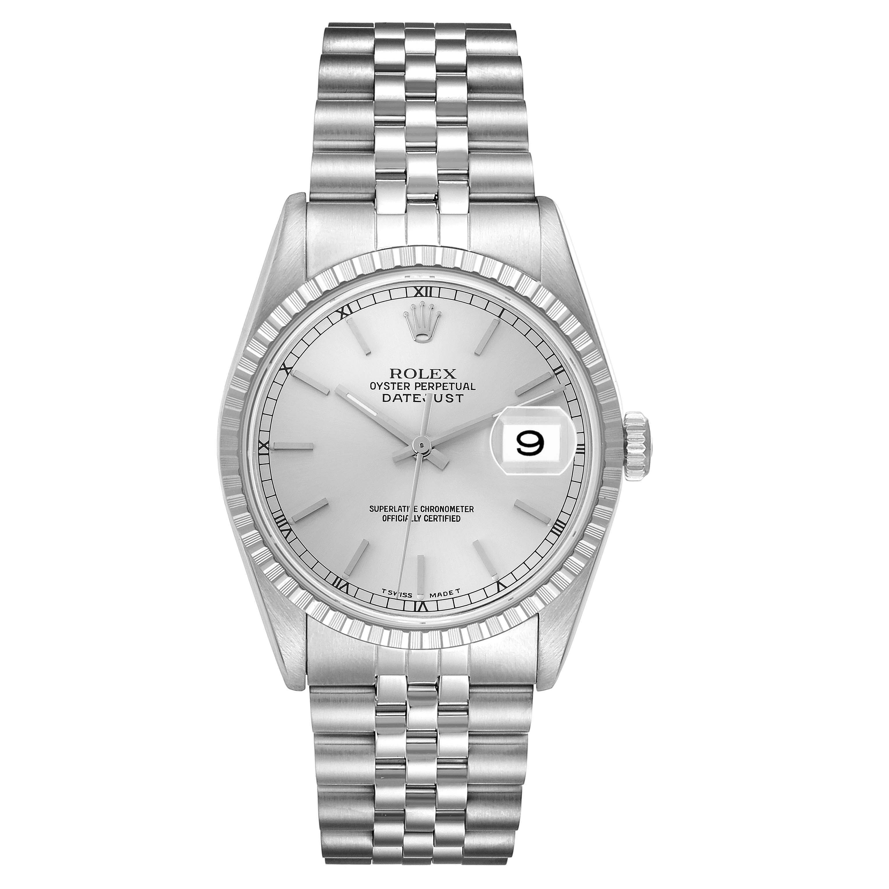 The Rolex Datejust 16220 Men
s Stainless Steel Silver Dial watch is shown from a top-down angle, displaying its dial, bracelet, and case details.