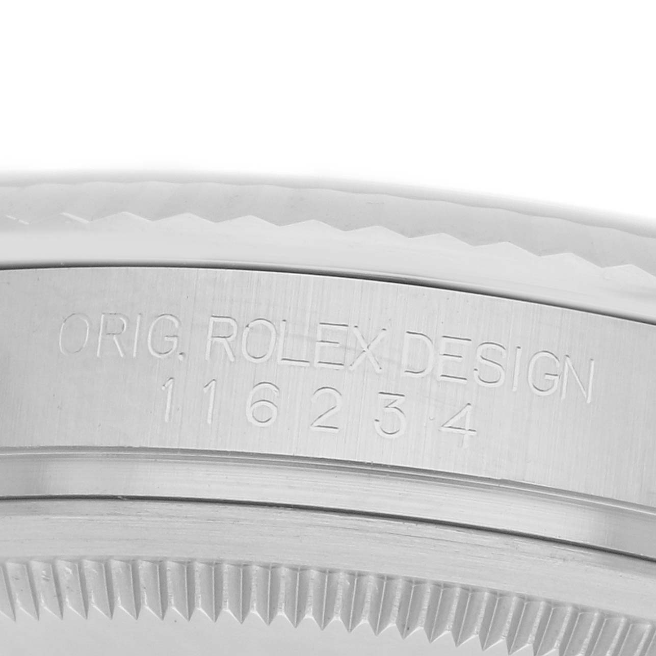 The image shows a close-up of the side of the Rolex Datejust 116234 Men
s Stainless Steel Black Dial
s case and bezel with engraved model and design details.