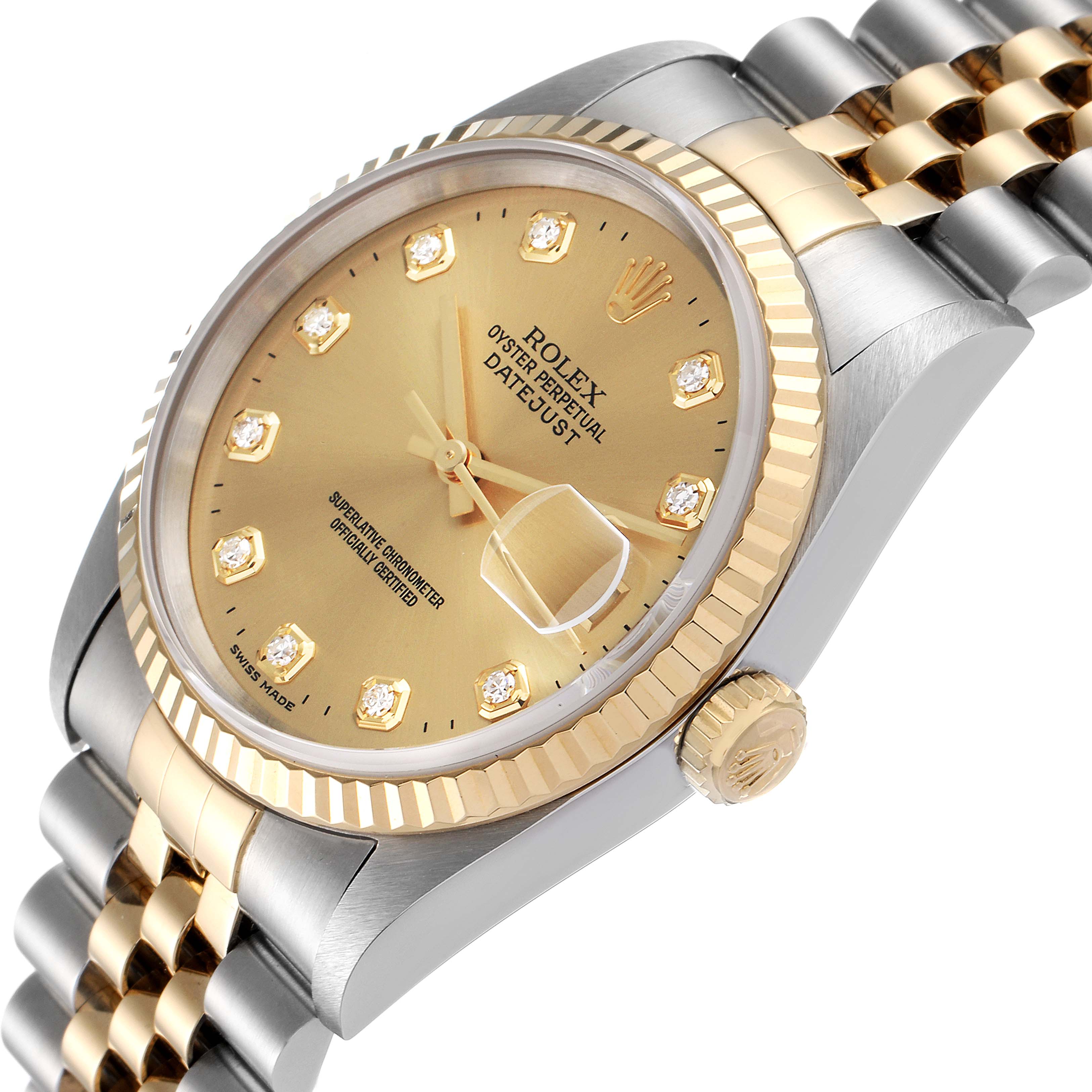 This image shows the dial, case, crown, and part of the bracelet of a gold Rolex Datejust 16233 Men's Steel and Gold (two tone) Champagne Dial 16233 Men's Steel and Gold (two tone) Champagne Dial watch at a slight angle.