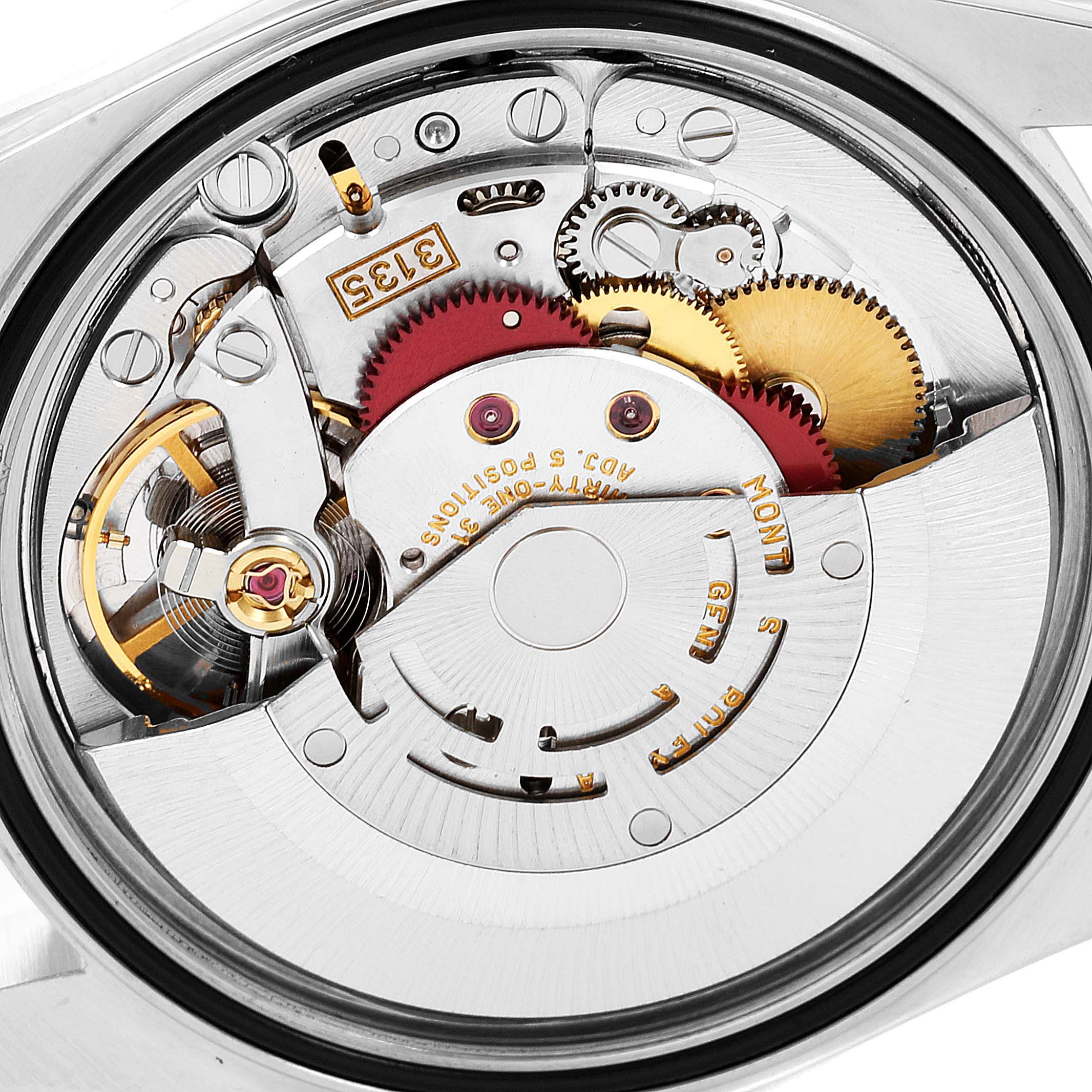 The image shows a close-up of the Rolex Datejust 16233 Men's Steel and Gold (two tone) Champagne Dial 16233 Men's Steel and Gold (two tone) Champagne Dial watch movement, highlighting gears and intricate mechanical parts.