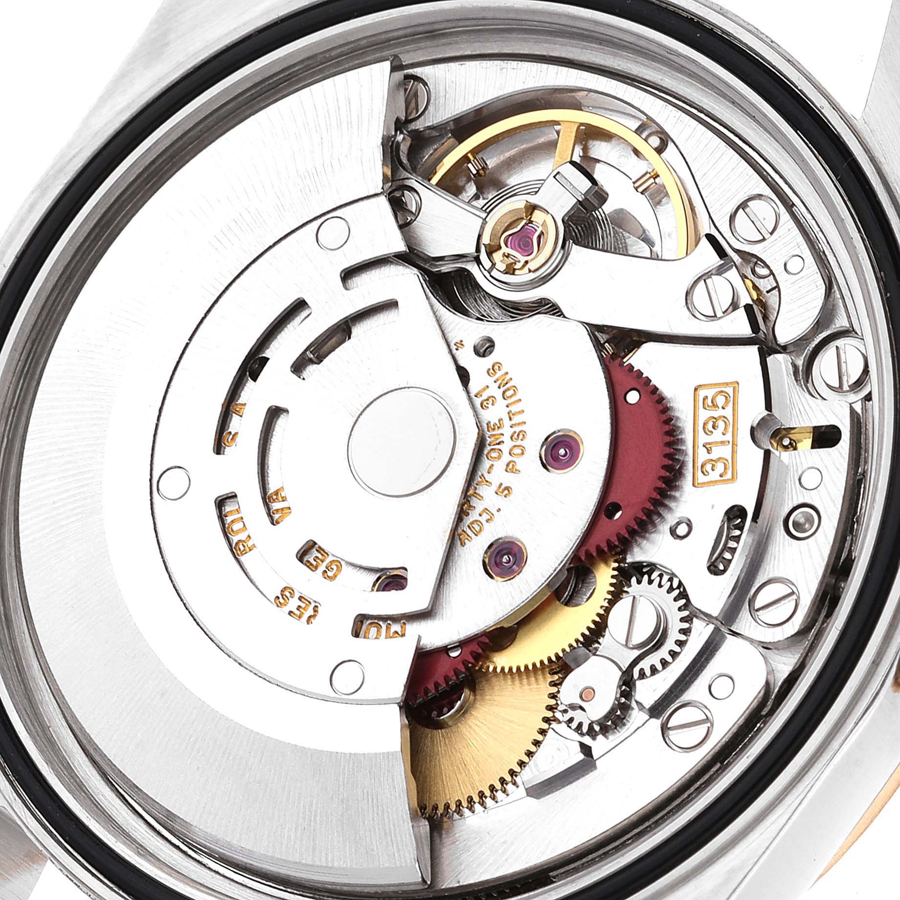 The image shows the internal mechanism and movement of a Rolex Datejust 16233 Men's Steel and Gold (two tone) White Dial 16233 Men's Steel and Gold (two tone) White Dial watch from a close-up angle.