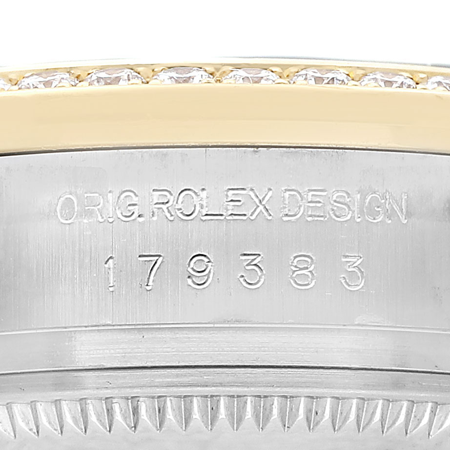The image shows the side of a Rolex Datejust 179383 Women's Steel and Gold (two tone) Grey Dial, highlighting "ORIG ROLEX DESIGN" and the model number 179383 near the watch bezel.