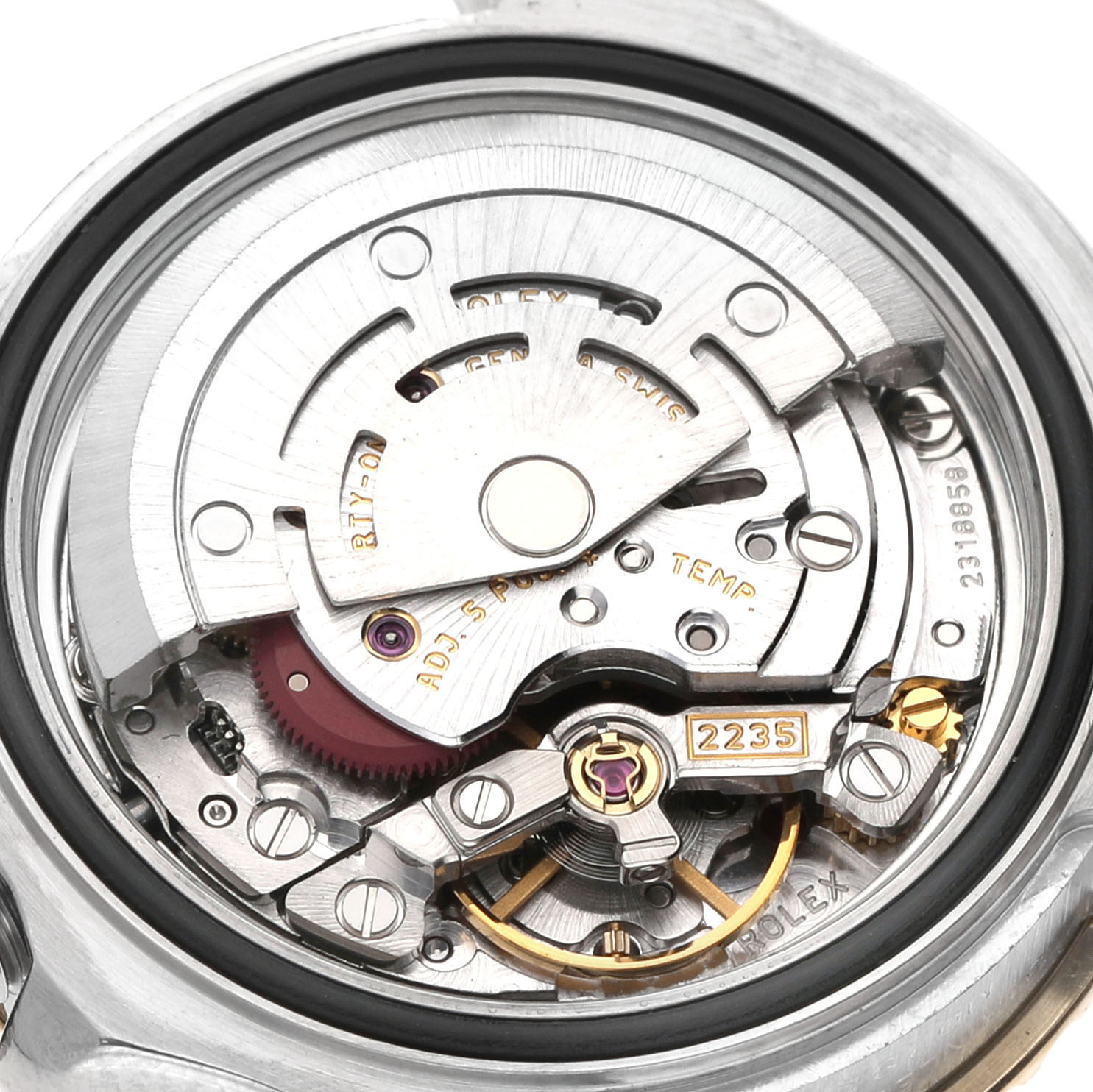 The image shows the movement mechanism of a Rolex Datejust 179383 Women's Steel and Gold (two tone) Grey Dial watch, viewed from the back with intricate gears and components visible.