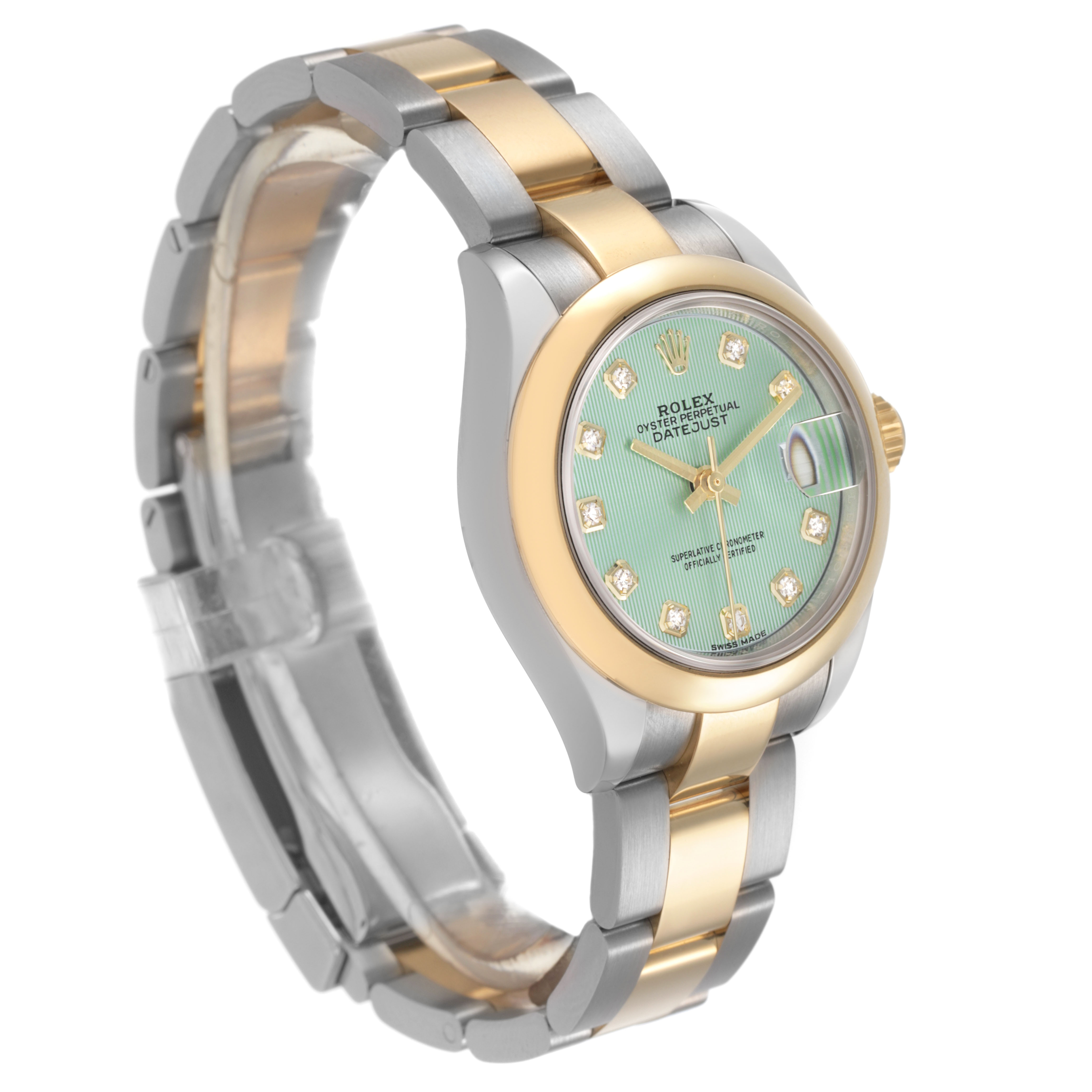 The Rolex Datejust 279163 Women's Steel and Gold (two tone) Green Dial watch is shown at a side angle, displaying its dial, bracelet, and part of the clasp.