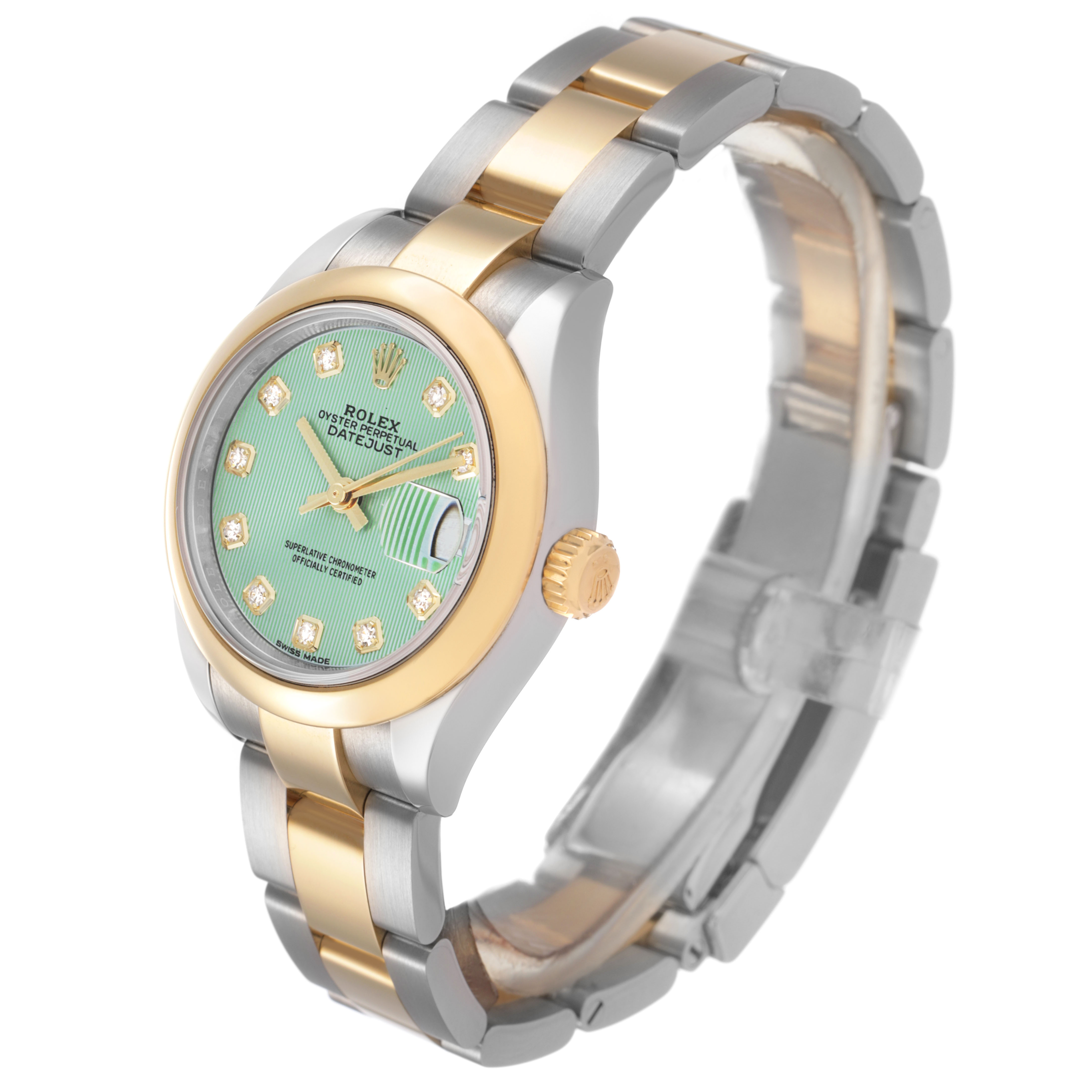 The Rolex Datejust 279163 Women's Steel and Gold (two tone) Green Dial watch is shown at a three-quarter angle, highlighting its dial, bezel, crown, and bracelet.