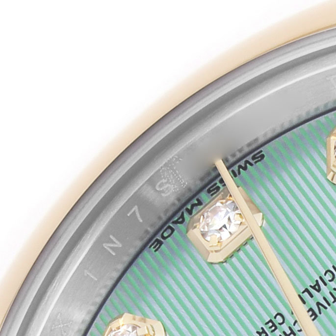 The image shows a close-up of the Rolex Datejust 279163 Women's Steel and Gold (two tone) Green Dial watch dial, highlighting the edge, diamond hour markers, and "SWISS MADE" text.