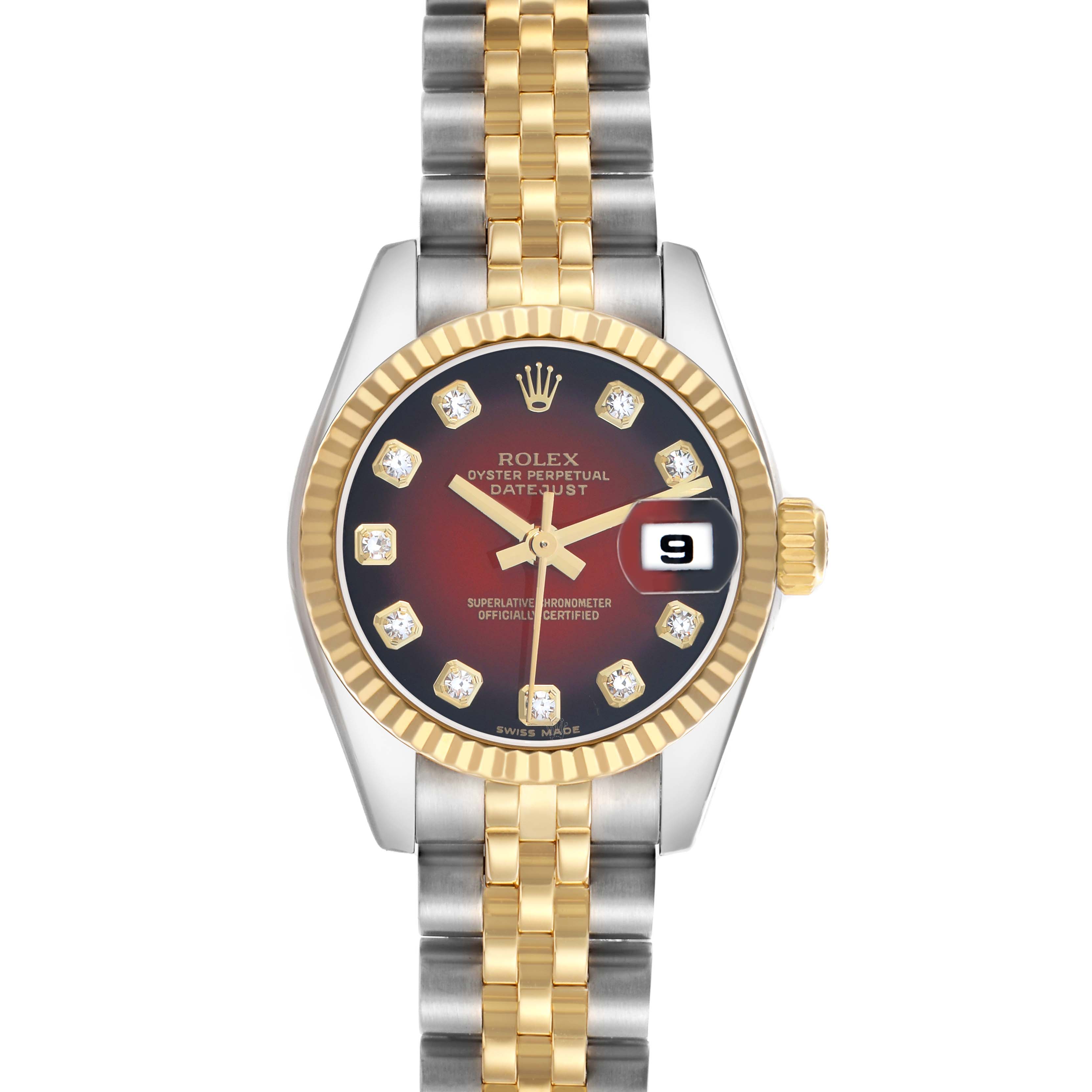 The Rolex Datejust 179173 Women
s Steel and Gold (two tone) Red Dial watch is shown from a top view highlighting its dial, bezel, bracelet, and crown.