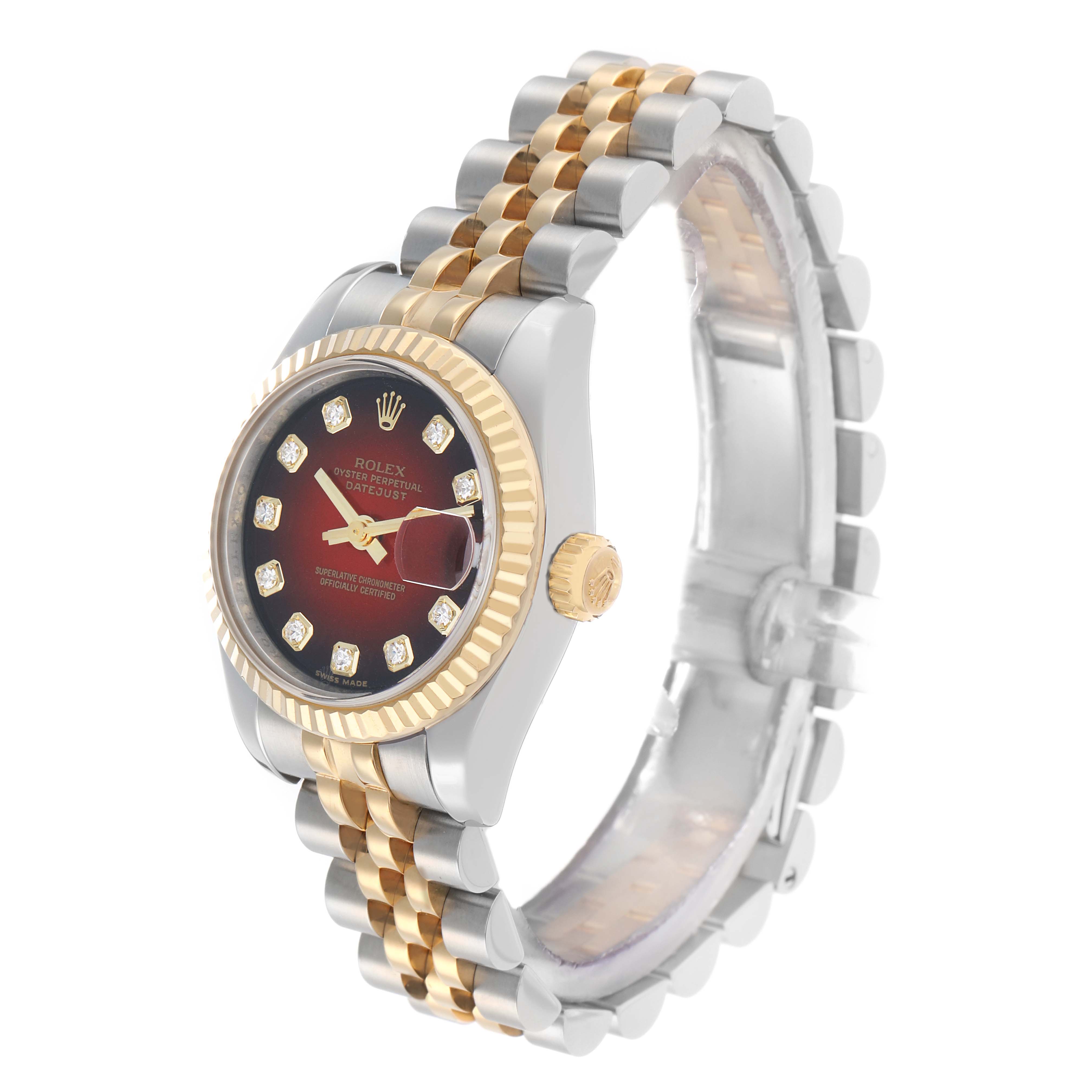 The Rolex Datejust 179173 Women
s Steel and Gold (two tone) Red Dial watch is shown at a three-quarter angle, highlighting its dial, bezel, crown, and two-tone bracelet.