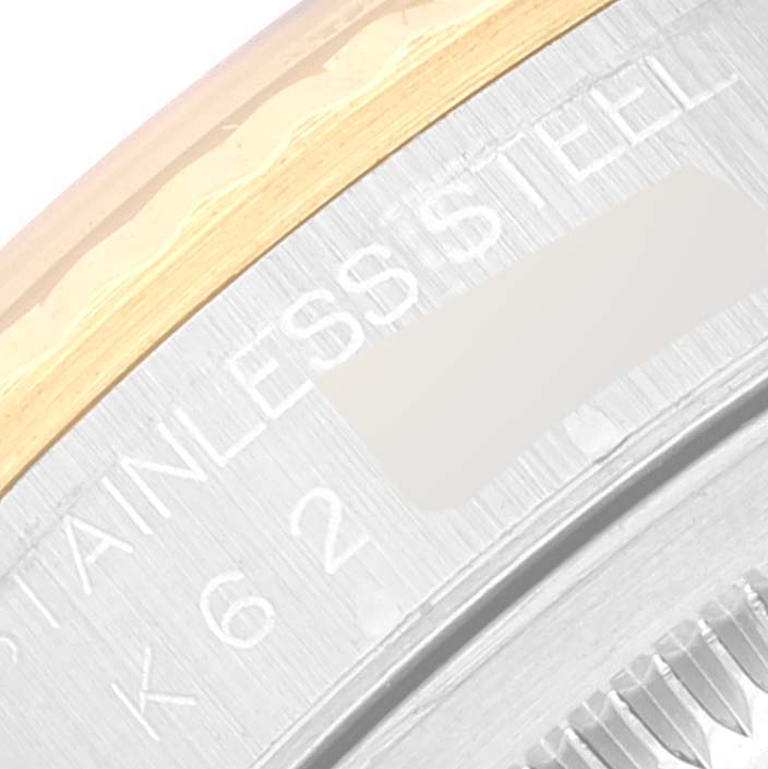 This image shows a close-up of the outer casing and bezel of the Rolex Datejust 16233 Men's Steel and Gold (two tone) Grey Dial 16233 Men's Steel and Gold (two tone) Grey Dial watch, revealing the stainless steel and gold details.