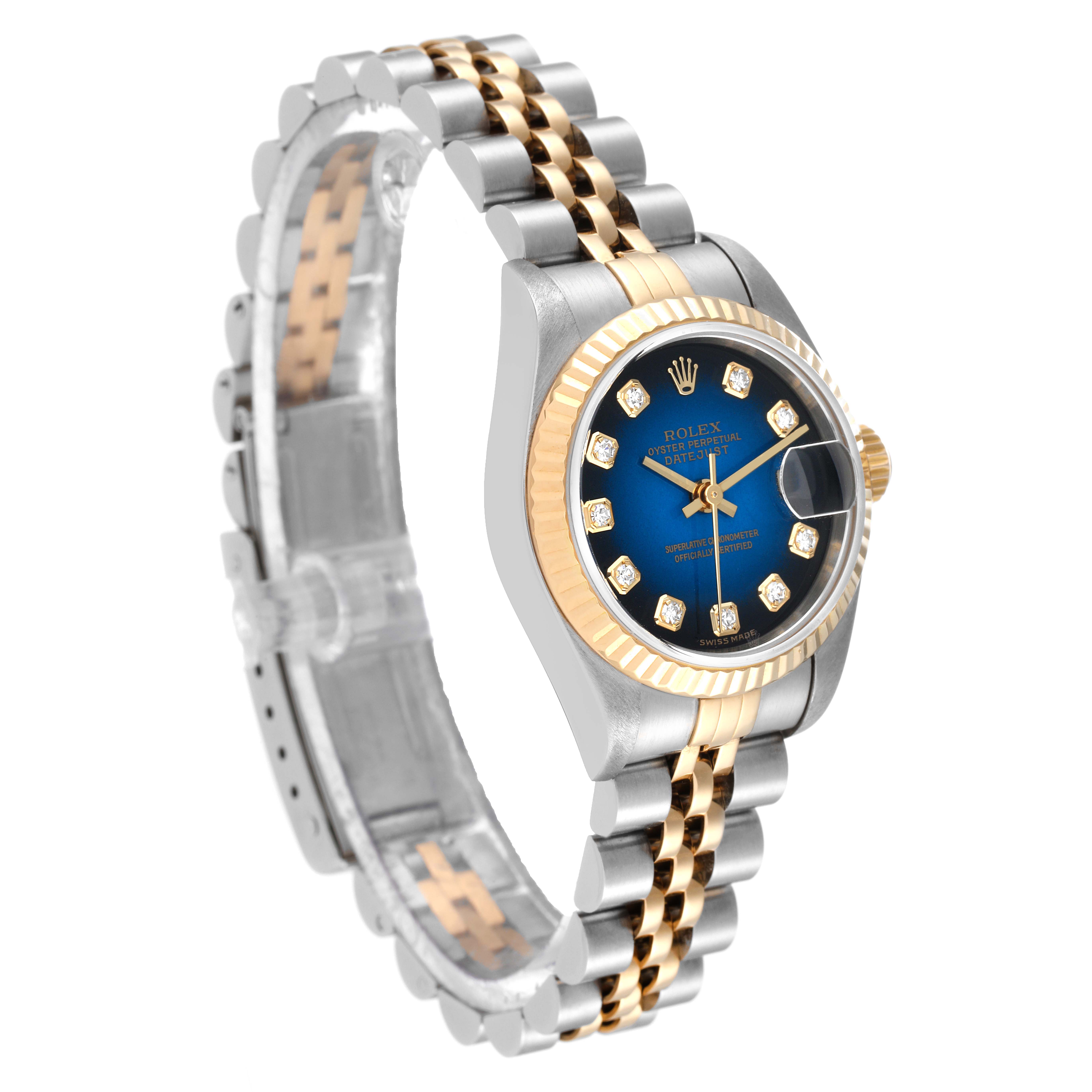 The image shows a side angle of a Rolex Datejust 79173 Women's Steel and Gold (two tone) Blue Dial 79173 Women's Steel and Gold (two tone) Blue Dial watch, featuring its bracelet, bezel, and dial.