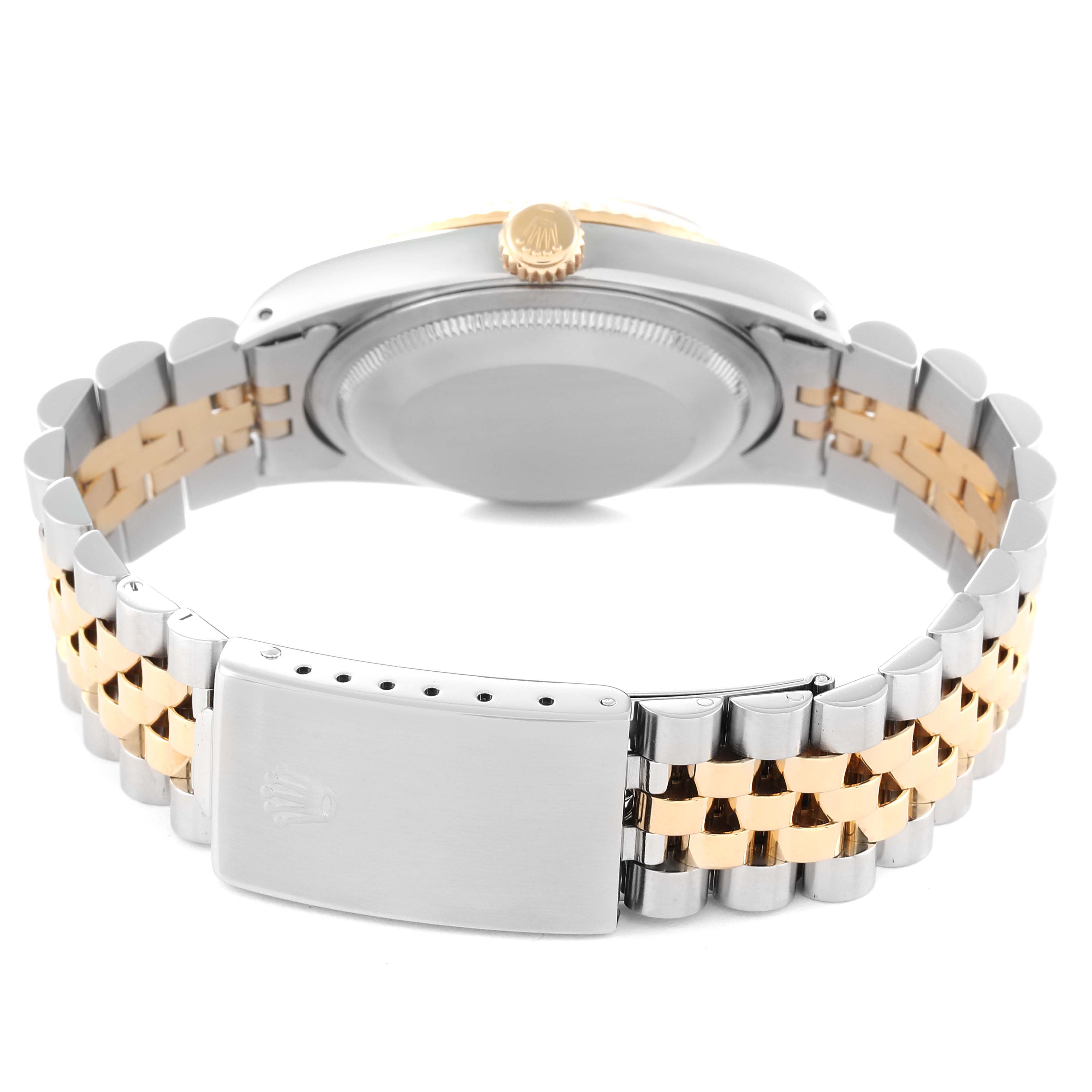 This image shows the back view of a Rolex Datejust 16233 Men's Steel and Gold (two tone) White Dial 16233 Men's Steel and Gold (two tone) White Dial watch, highlighting its case back, crown, and two-tone metal bracelet.