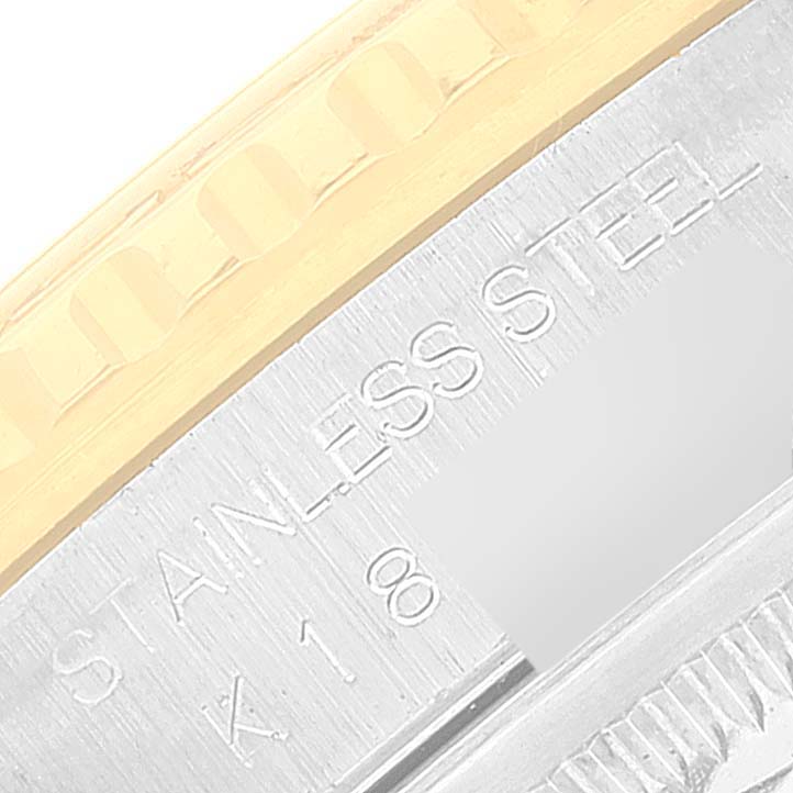 This image shows a close-up of the bezel and case side of the Rolex Turn-o-Graph 16263 Men
s Steel and Gold (two tone) White Dial 16263 Men
s Steel and Gold (two tone) White Dial watch, highlighting the "STAINLESS STEEL" engraving.