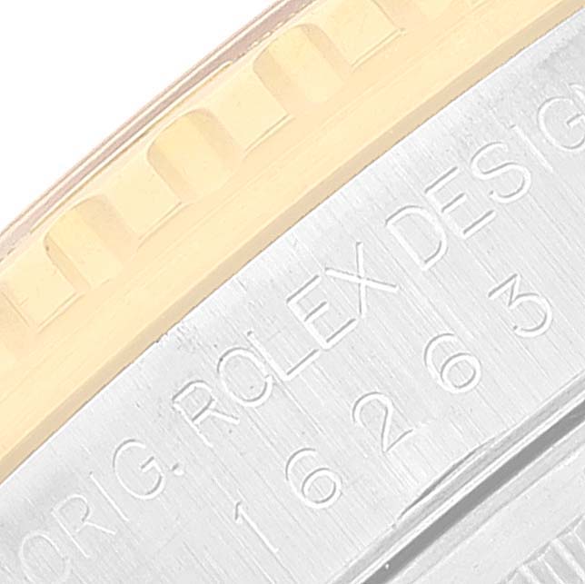 This image shows a close-up of the bezel and engraved case side of a Rolex Turn-o-Graph 16263 Men
s Steel and Gold (two tone) White Dial 16263 Men
s Steel and Gold (two tone) White Dial watch.