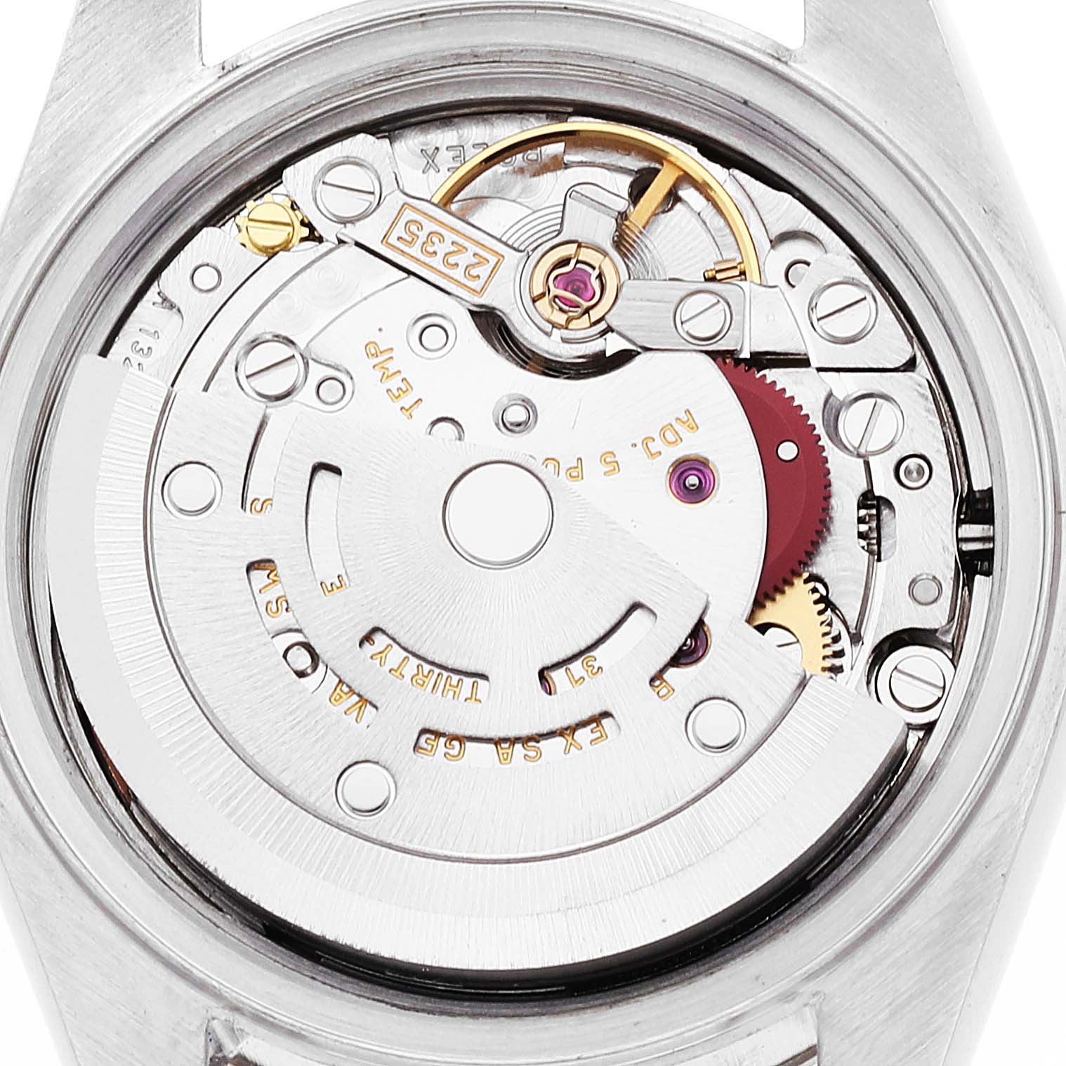 The image shows the inner mechanics or movement of a Rolex Datejust 79174 Women's Stainless Steel Orange Dial 79174 Women's Stainless Steel Orange Dial watch viewed from the back.