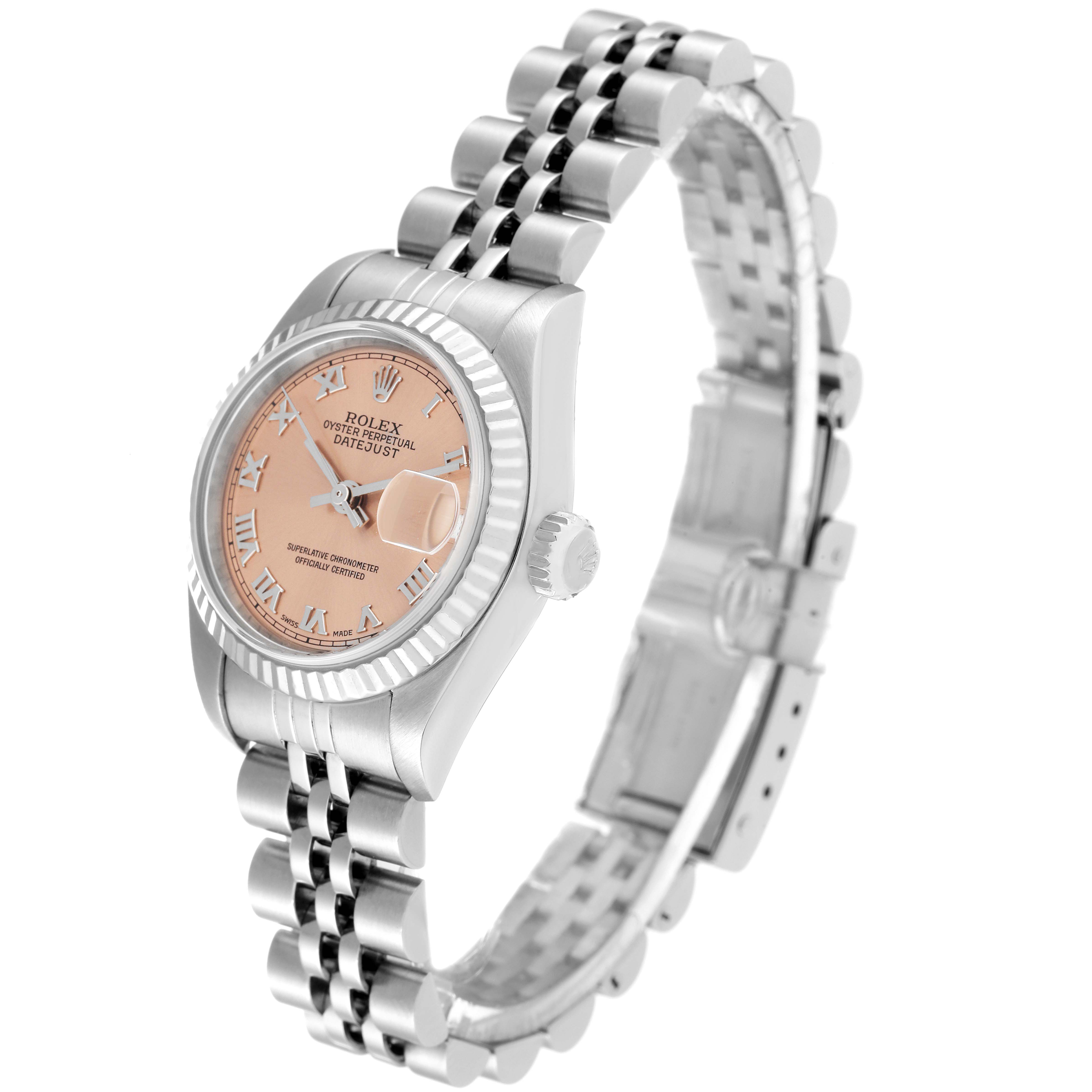 The image shows a side angle of a Rolex Datejust 79174 Women's Stainless Steel Orange Dial 79174 Women's Stainless Steel Orange Dial watch, highlighting the face, crown, and bracelet.