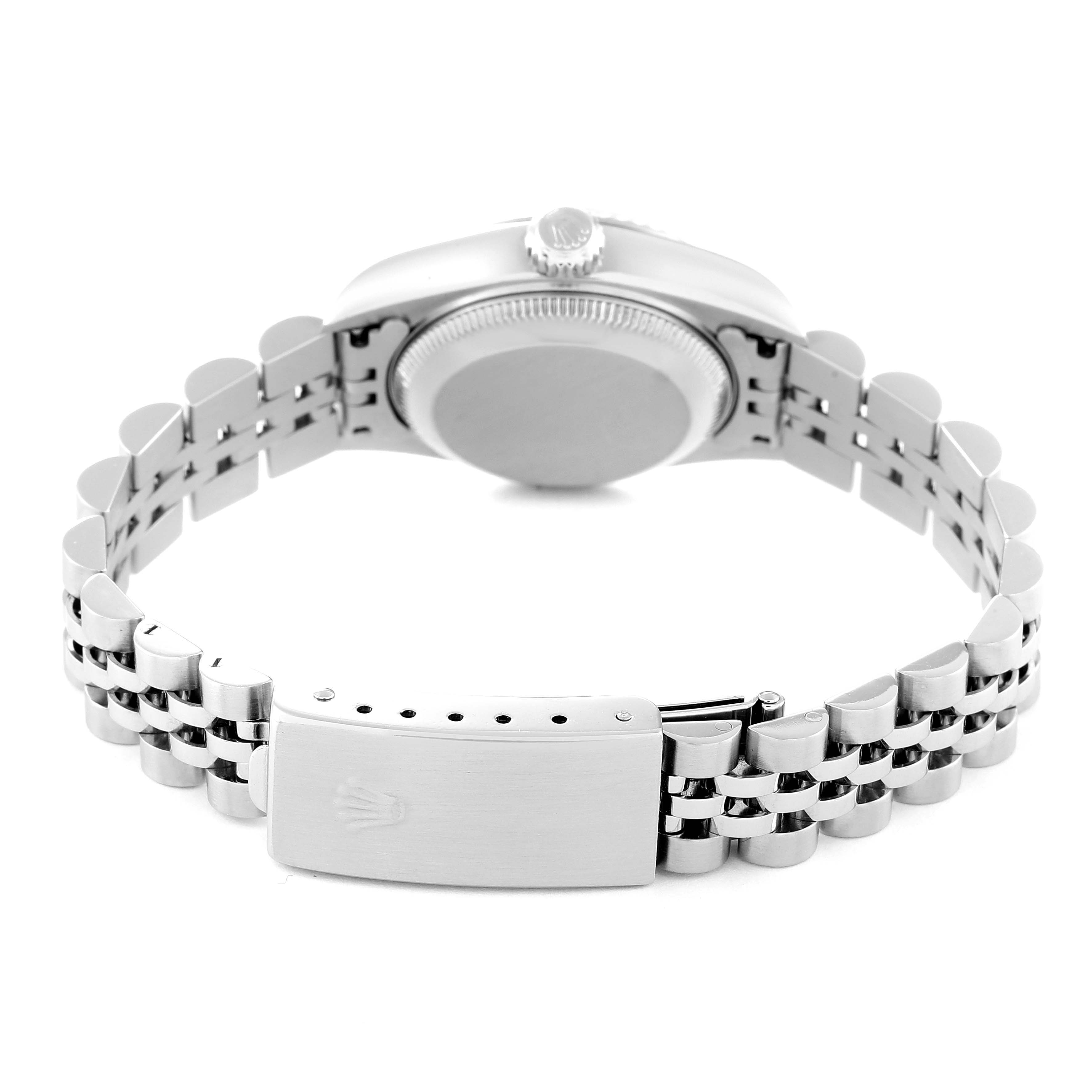 The image shows the backside and bracelet clasp of a Rolex Datejust 79174 Women's Stainless Steel Orange Dial 79174 Women's Stainless Steel Orange Dial watch.