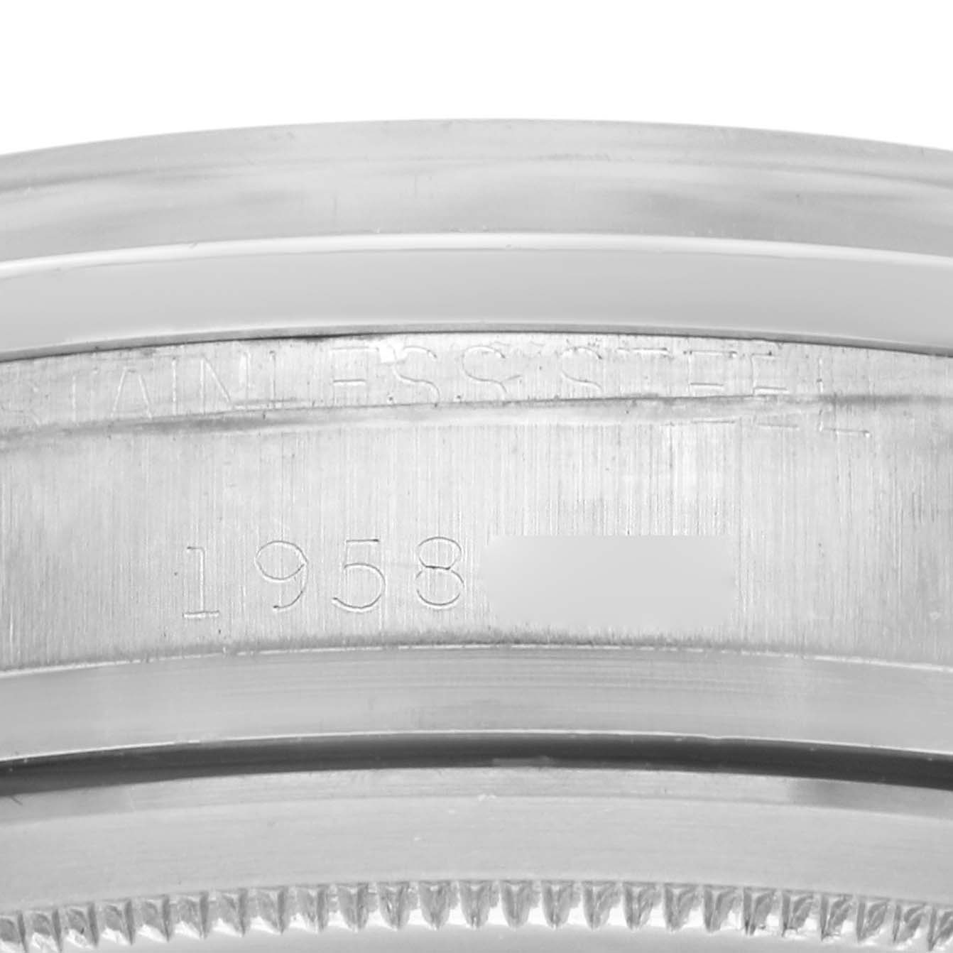 The image shows a close-up angle focusing on the edge of the case and engraving of the Rolex Daytona 6239 Men
s Stainless Steel Black Dial watch.