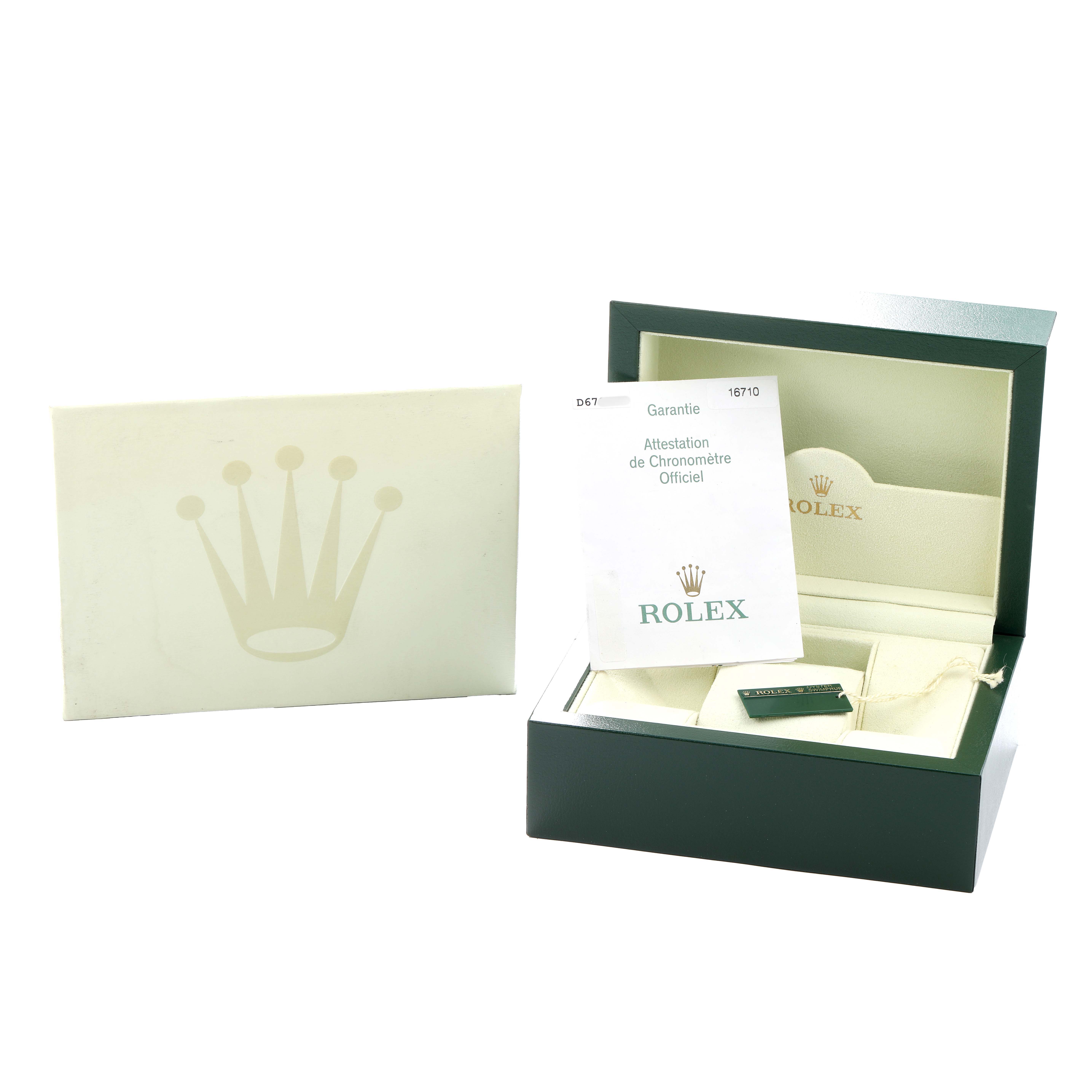 The image shows the packaging and warranty papers for a Rolex GMT-Master 16710 Men
s Stainless Steel Black Dial, including a green box and official documents.