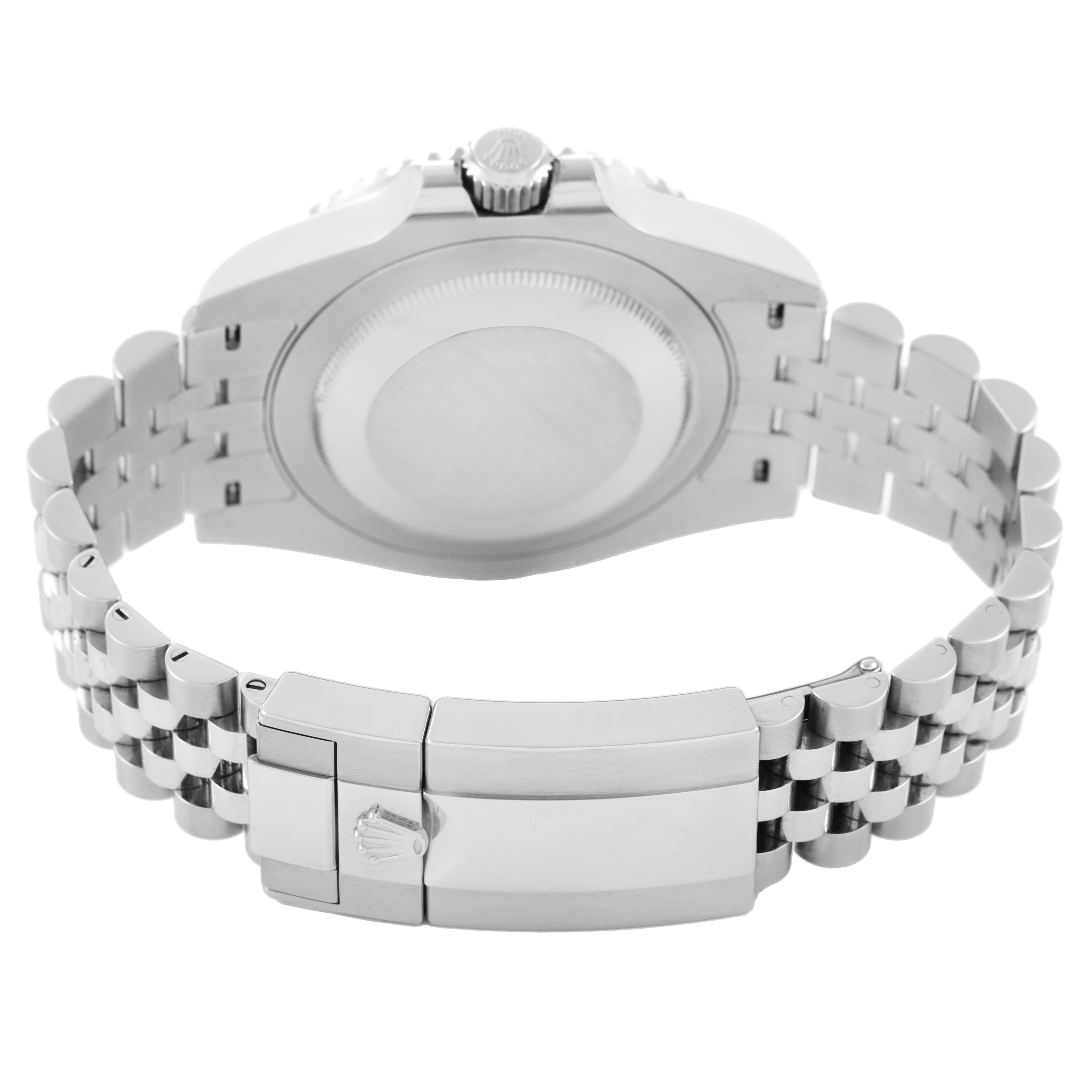 The image shows the back view of a Rolex GMT-Master 126710GRNR Men's Stainless Steel Black Dial model, highlighting the case back, crown, and Jubilee bracelet.