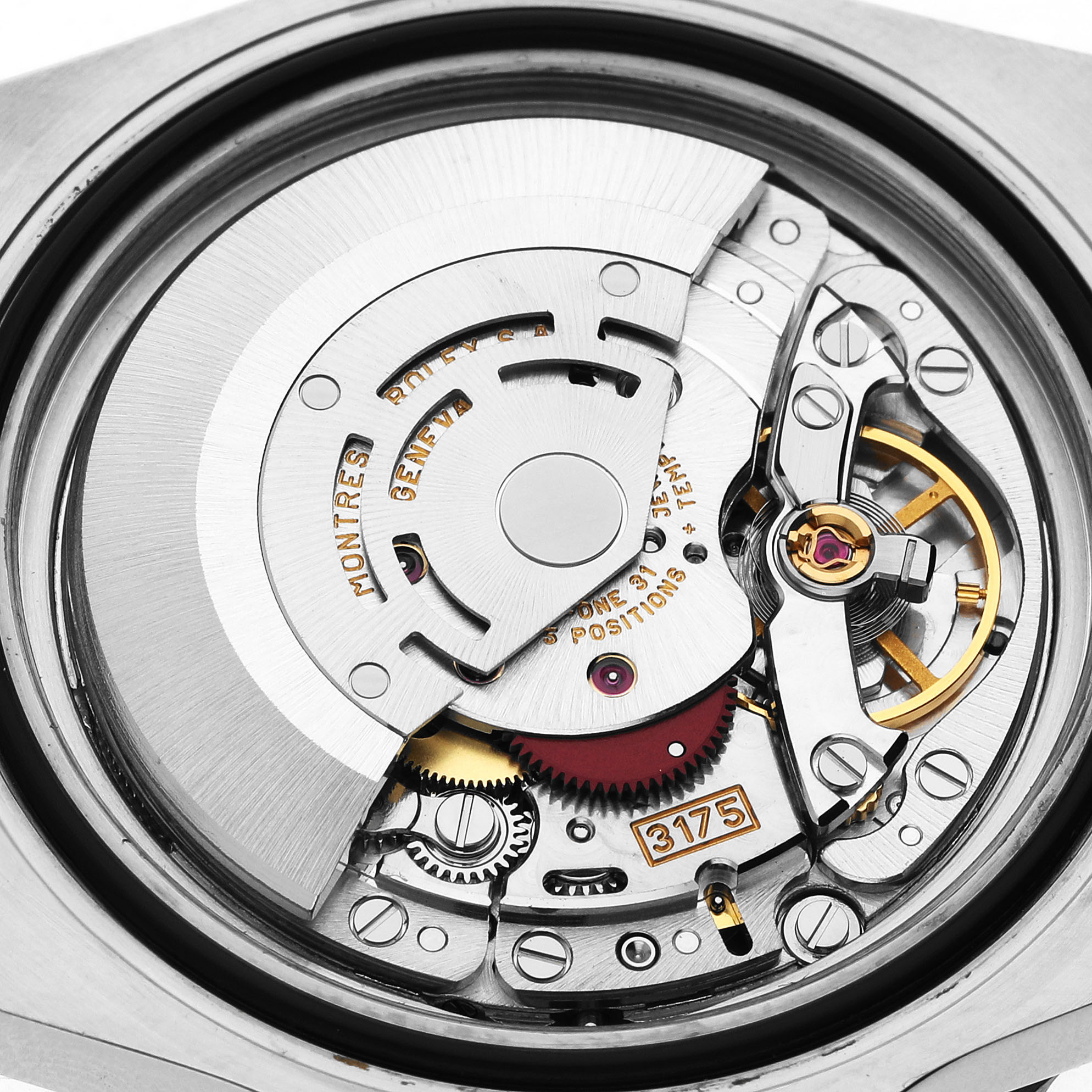 The image shows the intricate movement components of a Rolex GMT-Master 16700 Men's Stainless Steel Black Dial watch from a top-down angle.