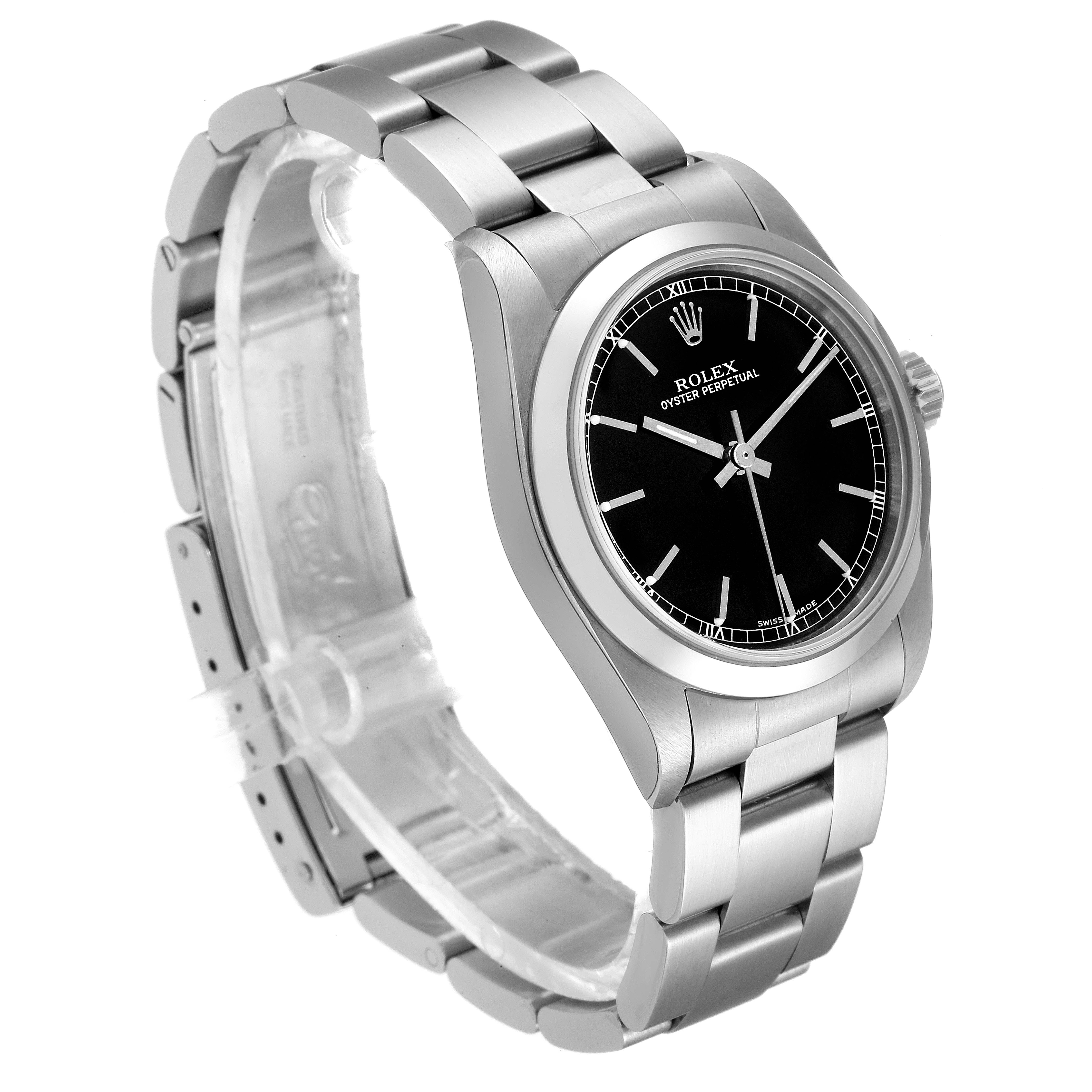 The Rolex Mid-Size 77080 Women's Stainless Steel Black Dial 77080 Women's Stainless Steel Black Dial watch is shown at an angle displaying the face, bezel, crown, and a partial view of the bracelet.