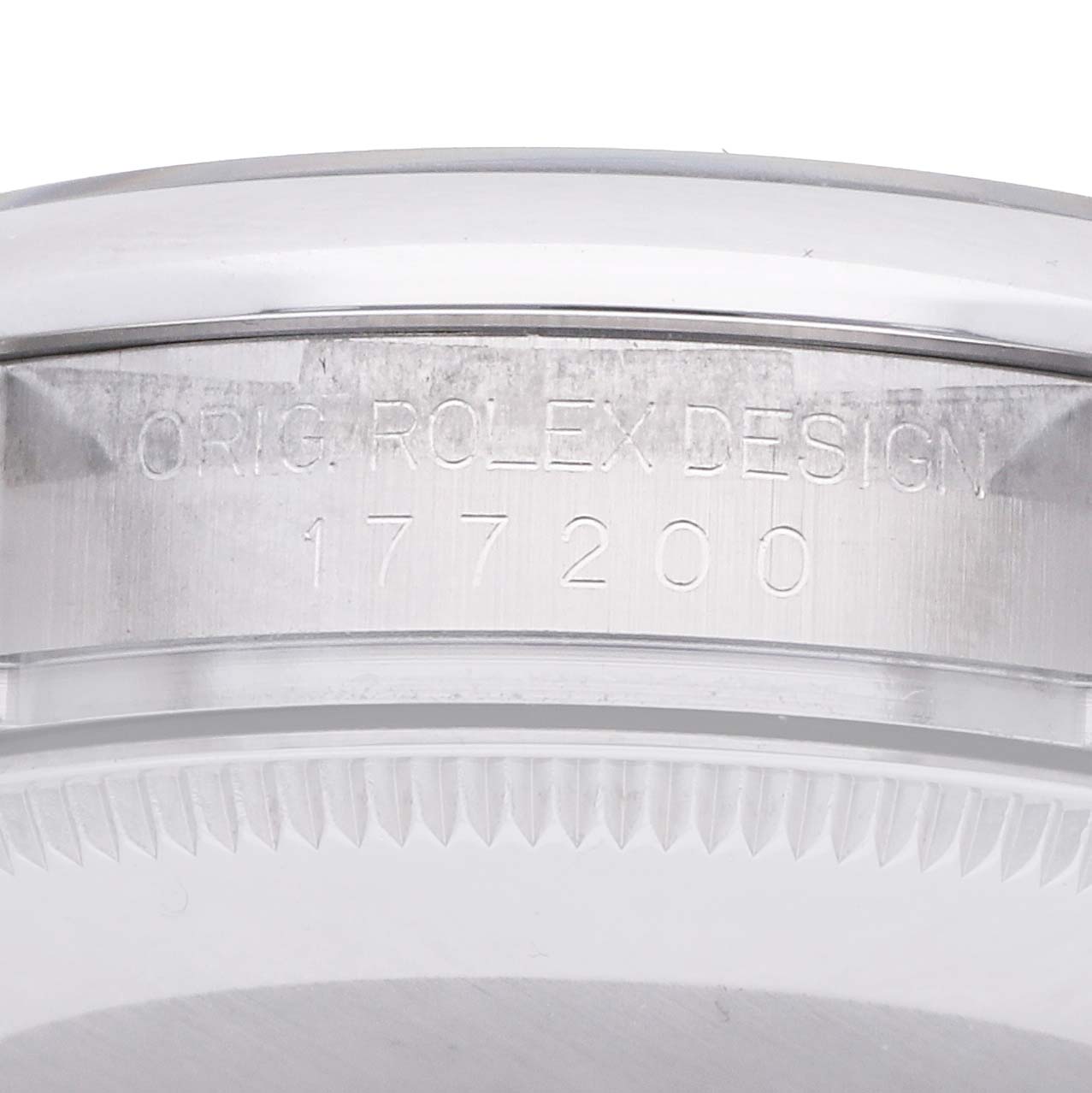 The image shows the case side of a Rolex Mid-Size 177200 Women
s Stainless Steel Silver Dial watch model 177200, featuring the engraved design number.