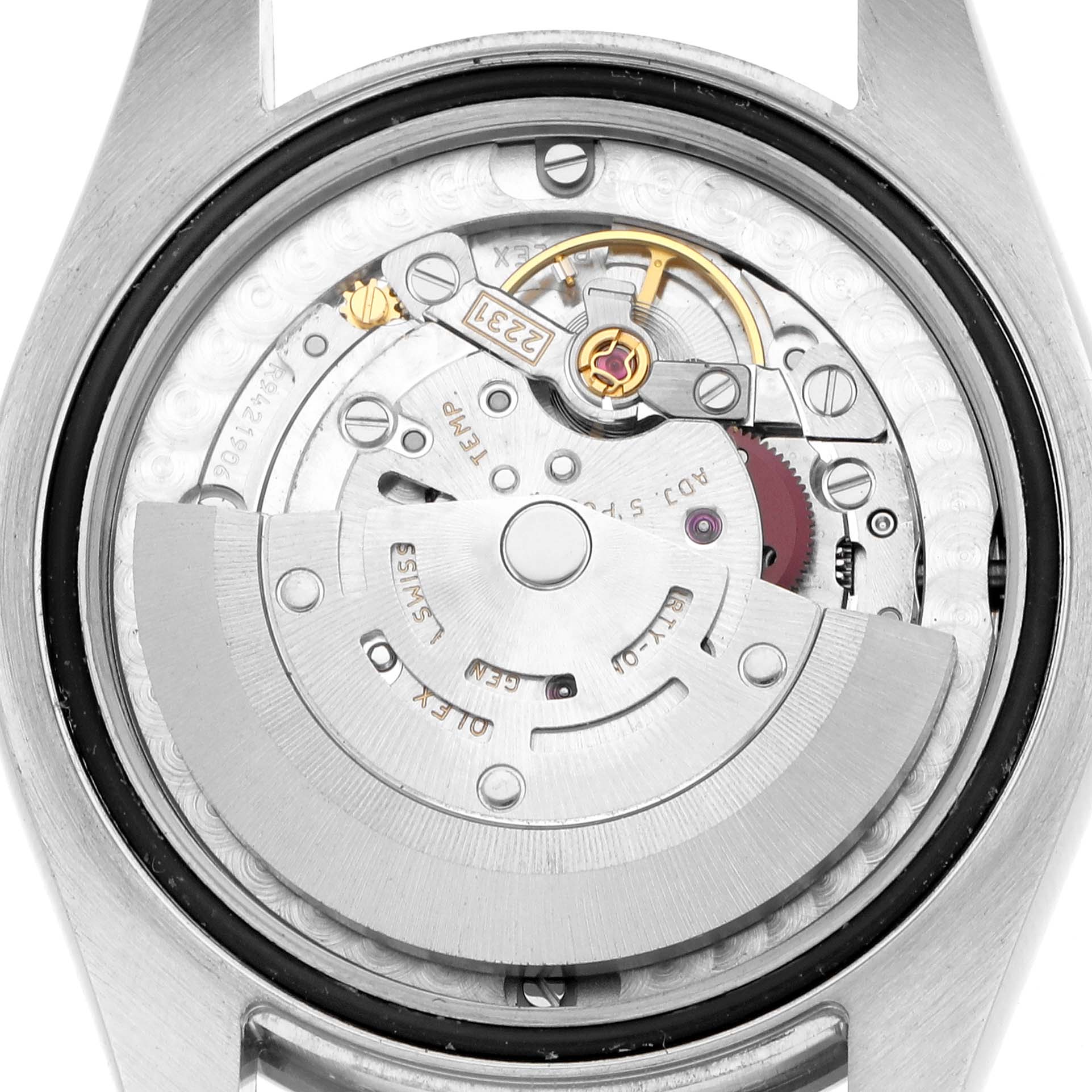 The image shows the inner mechanism of a Rolex Mid-Size 177200 Women
s Stainless Steel Silver Dial model, viewed from the back, highlighting the rotor and movement components.