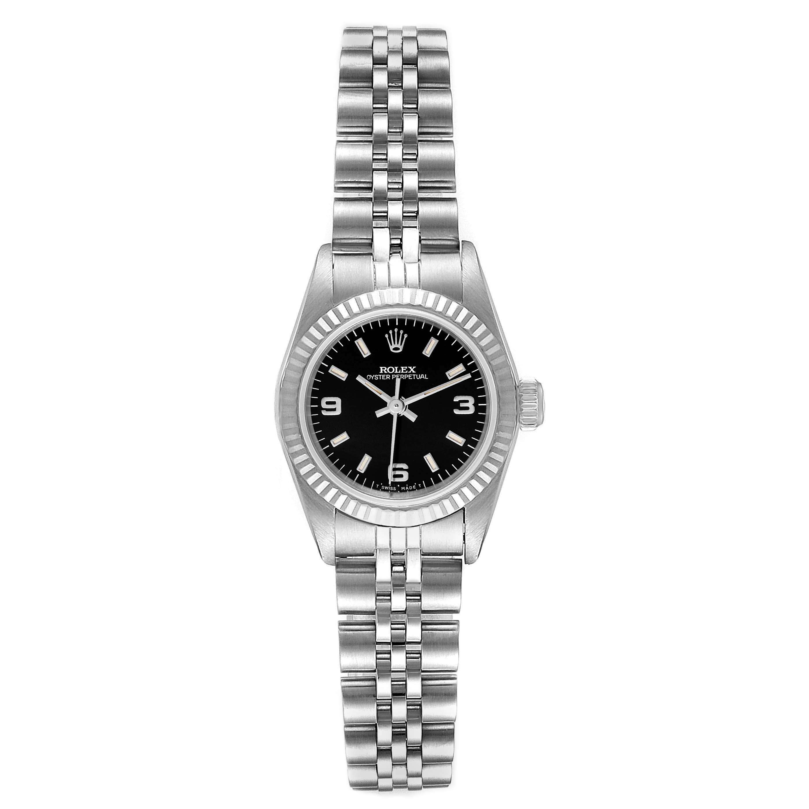The Rolex Oyster Perpetual 67194 Women's Stainless Steel Black Dial 67194 Women's Stainless Steel Black Dial watch is shown from the front, highlighting its black dial, stainless steel bracelet, and bezel.